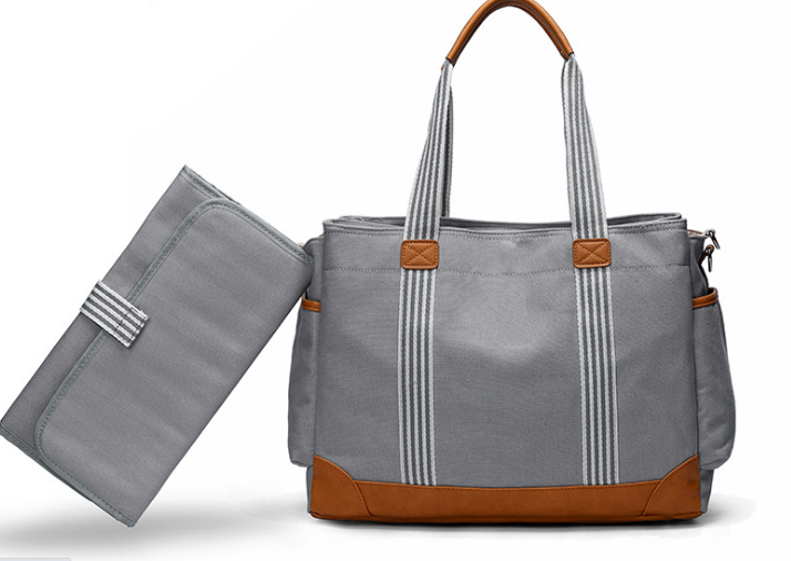 Multifunctional Large-capacity Canvas Portable Mummy Bag in stylish design, showcasing its spacious interior and durable polyester material.