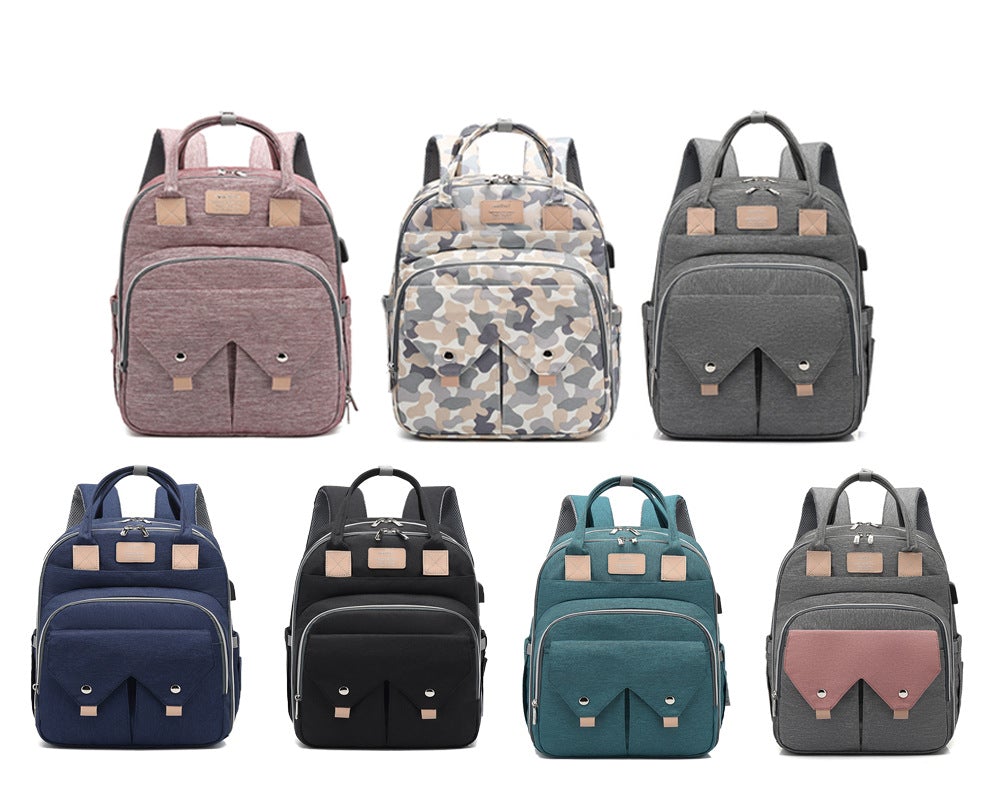 Multifunctional large-capacity mommy bag with USB port, showcasing its stylish design and multiple pockets.
