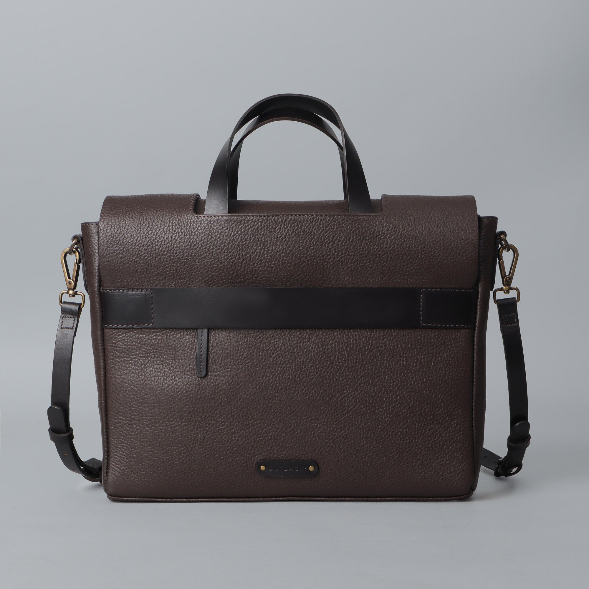 Muse Leather Briefcase made from premium full grain leather, featuring multiple pockets and a sleek design.