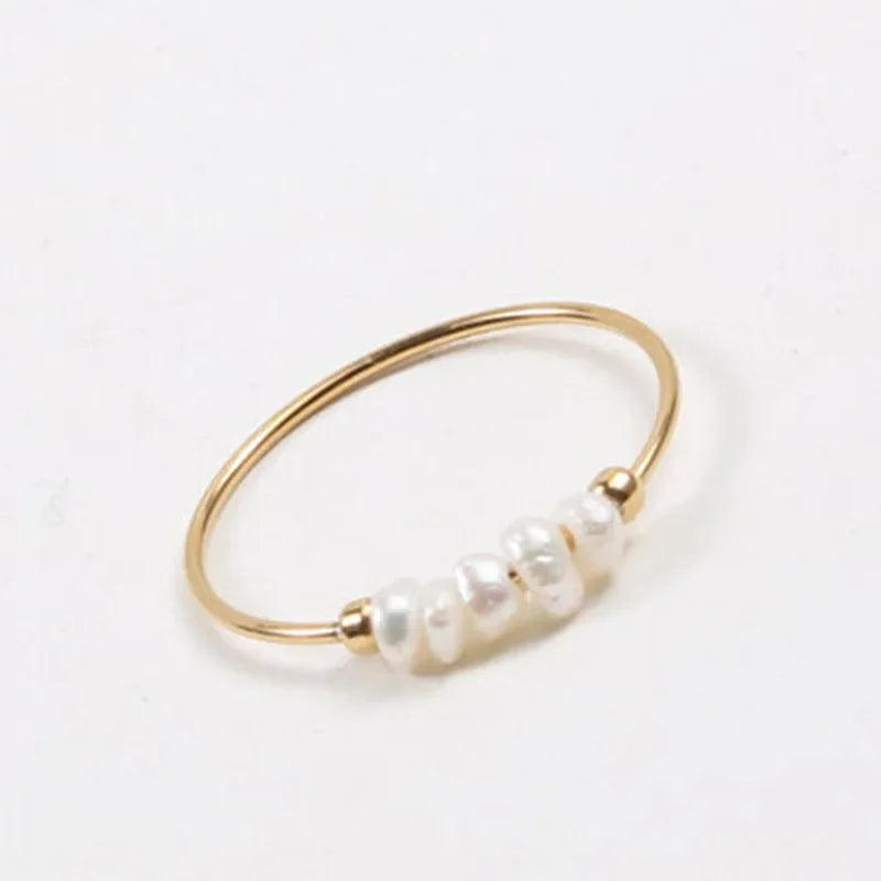 Natural Freshwater Pearl Ring featuring a lustrous pearl set in a durable titanium band, perfect for women.