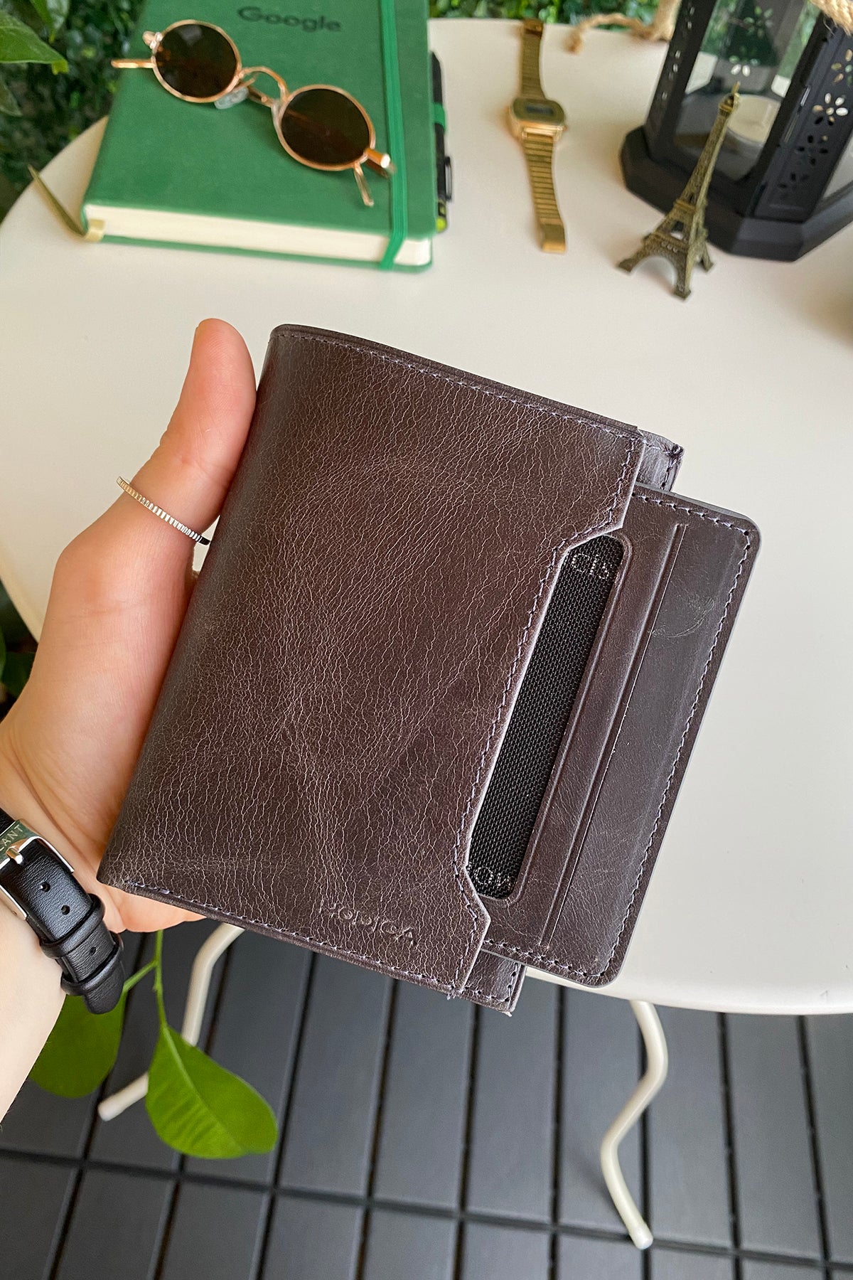 Oregon Genuine Leather Wallet featuring a removable card holder, showcasing its elegant design and multiple compartments.