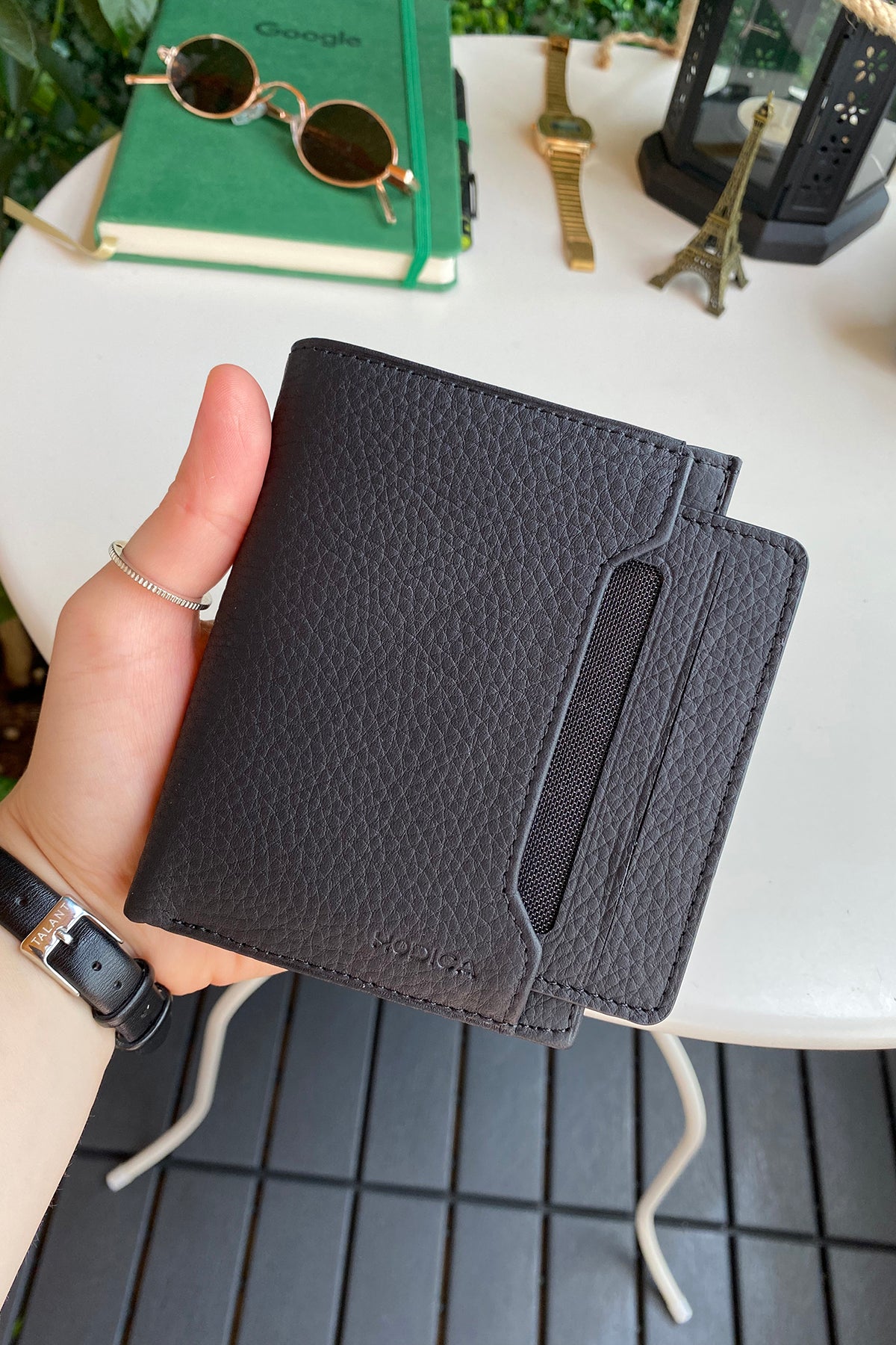 Oregon Genuine Leather Wallet featuring a removable card holder, showcasing its elegant design and multiple compartments.