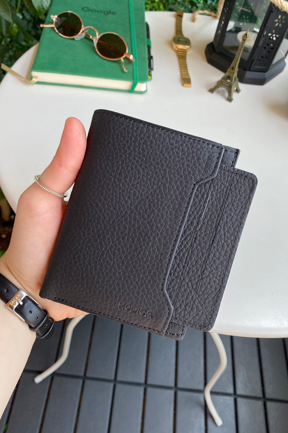 Oregon Genuine Leather Wallet featuring a removable card holder, showcasing its elegant design and multiple compartments.