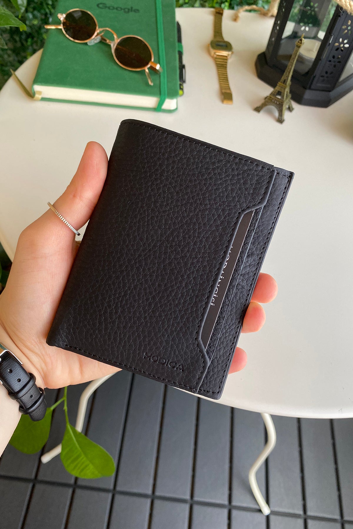 Oregon Genuine Leather Wallet featuring a removable card holder, showcasing its elegant design and multiple compartments.