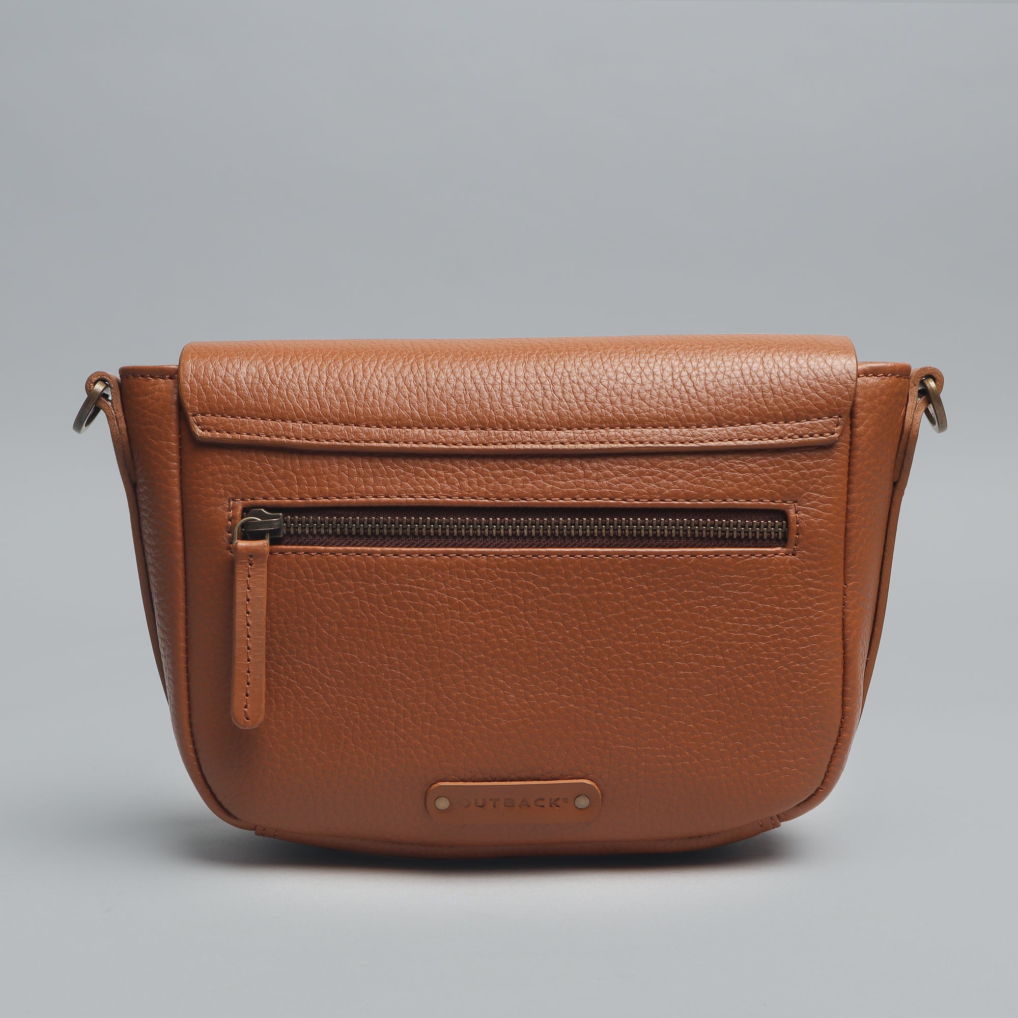 Oslo Crossbody Bag made from premium leather with spacious compartments and antique brass hardware, showcasing its elegant design.