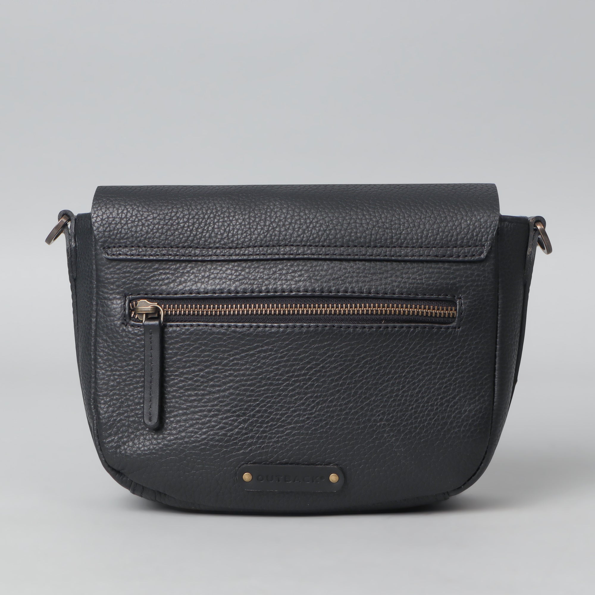 Oslo Crossbody Bag made from premium leather with spacious compartments and antique brass hardware, showcasing its elegant design.