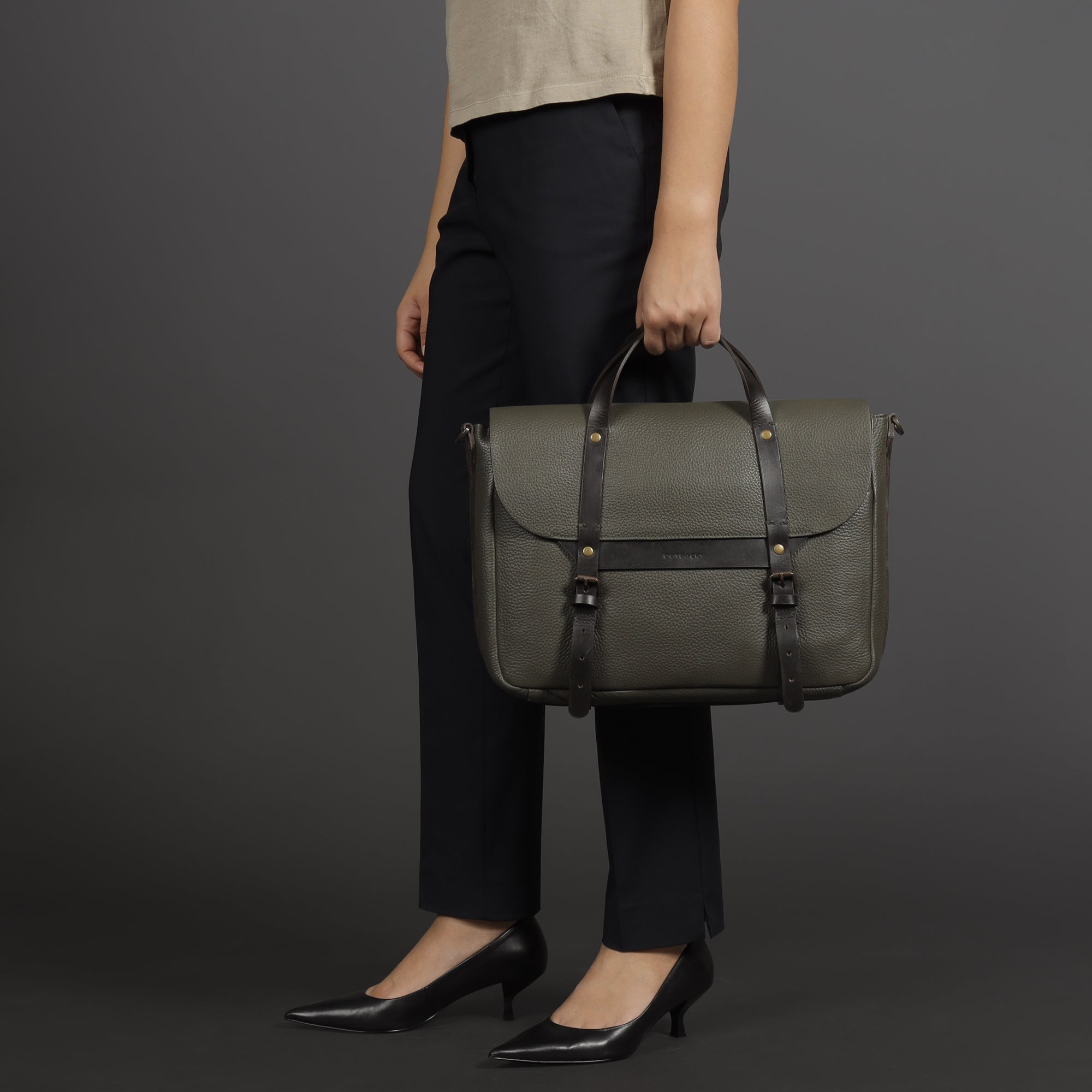 Oslo Leather Briefcase showcasing premium full grain leather, spacious compartments, and a comfortable shoulder strap.