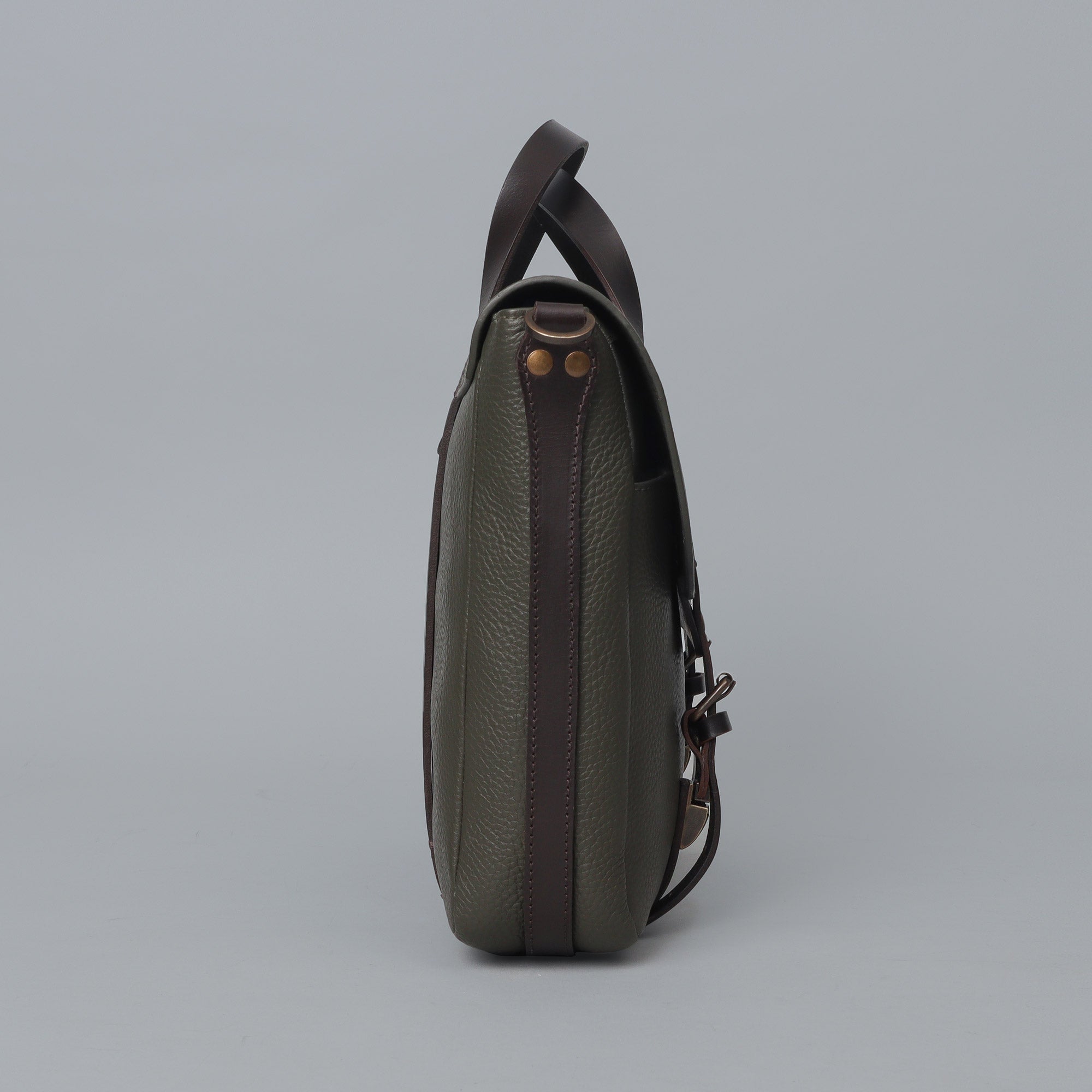 Oslo Leather Briefcase showcasing premium full grain leather, spacious compartments, and a comfortable shoulder strap.