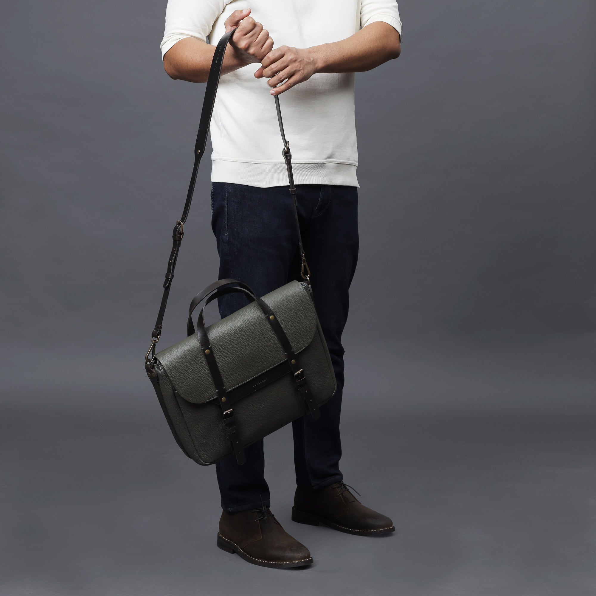 Oslo Leather Briefcase showcasing premium full grain leather, spacious compartments, and a comfortable shoulder strap.