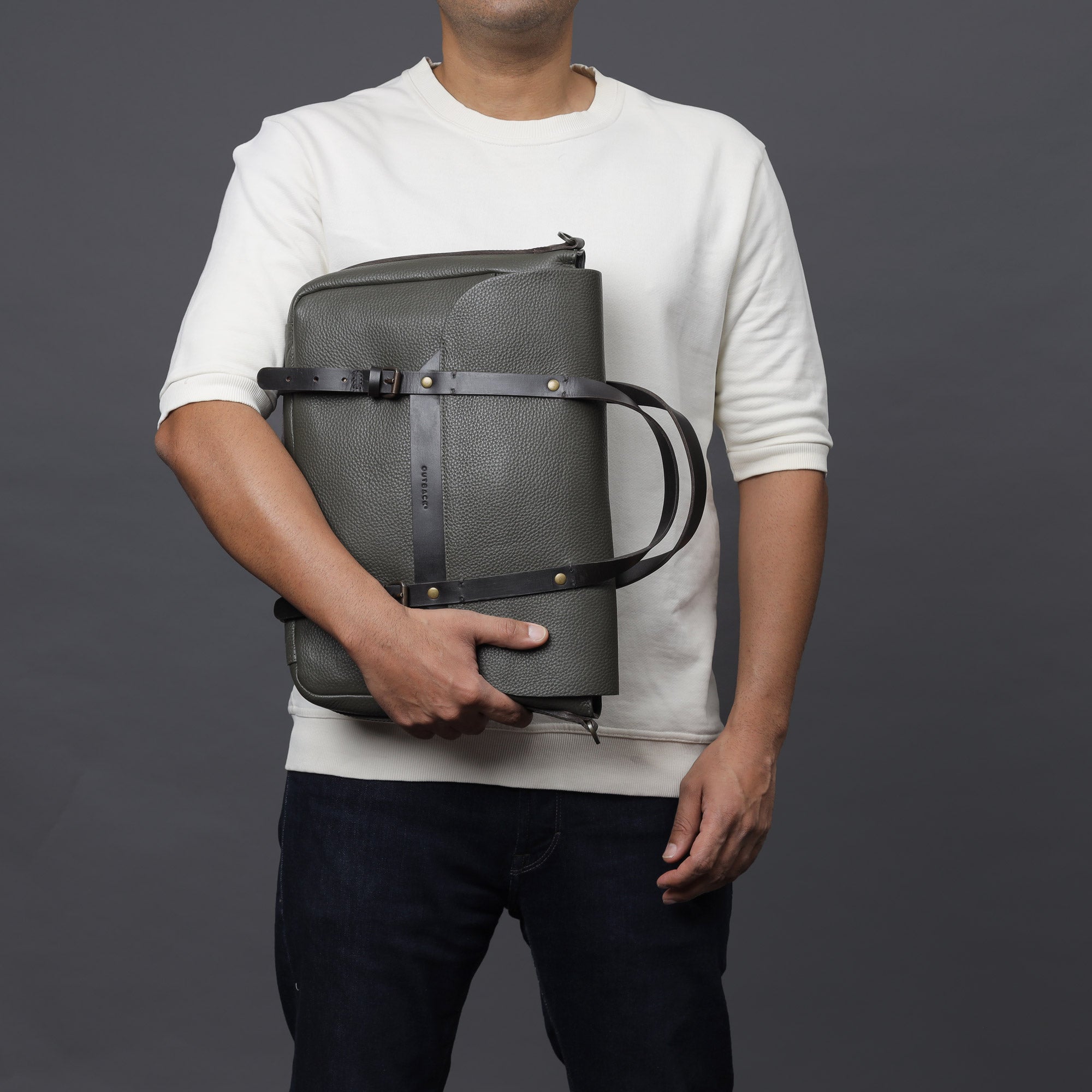 Oslo Leather Briefcase showcasing premium full grain leather, spacious compartments, and a comfortable shoulder strap.