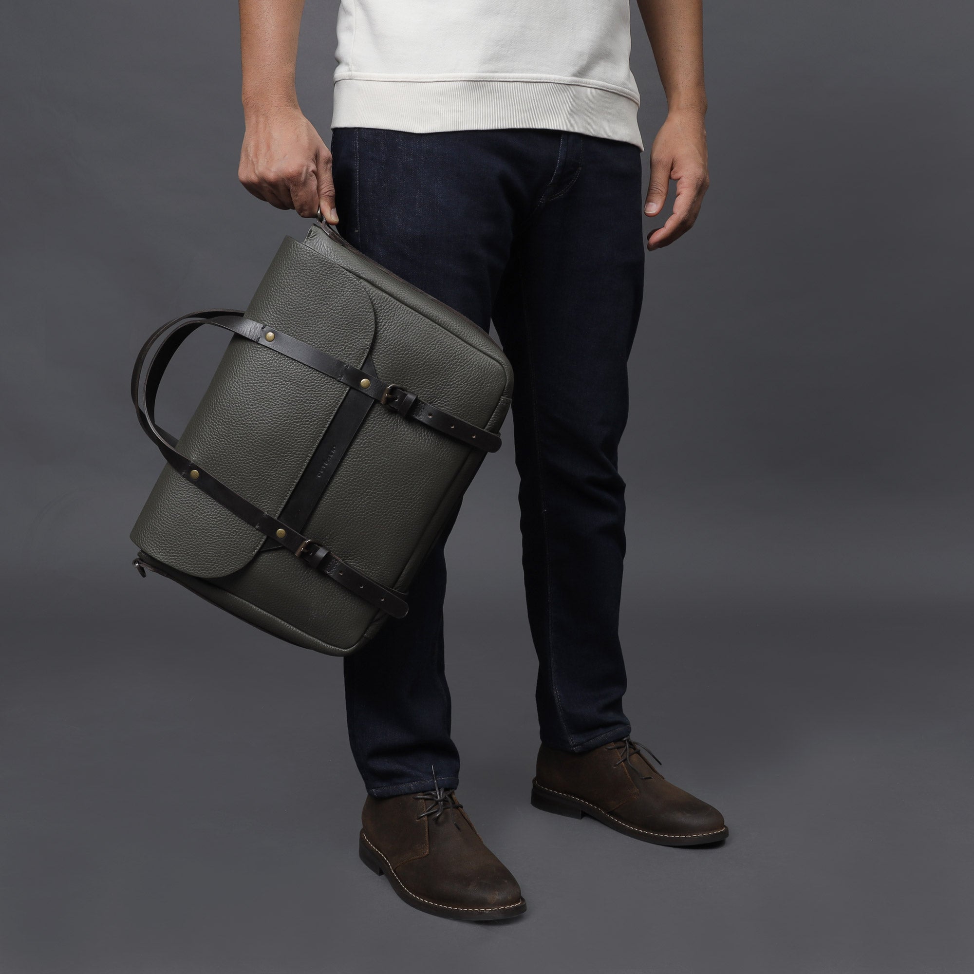 Oslo Leather Briefcase showcasing premium full grain leather, spacious compartments, and a comfortable shoulder strap.