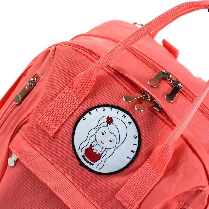 Overnight backpack featuring two main compartments, padded shoulder straps, and multiple pockets in a stylish design.