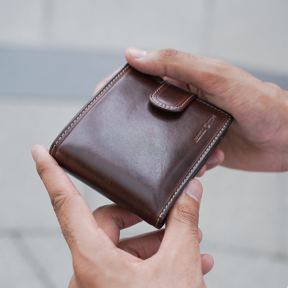 Oxford Billfold Wallet in Coffee color with coin pocket and tab closure, showcasing its compact and stylish design.