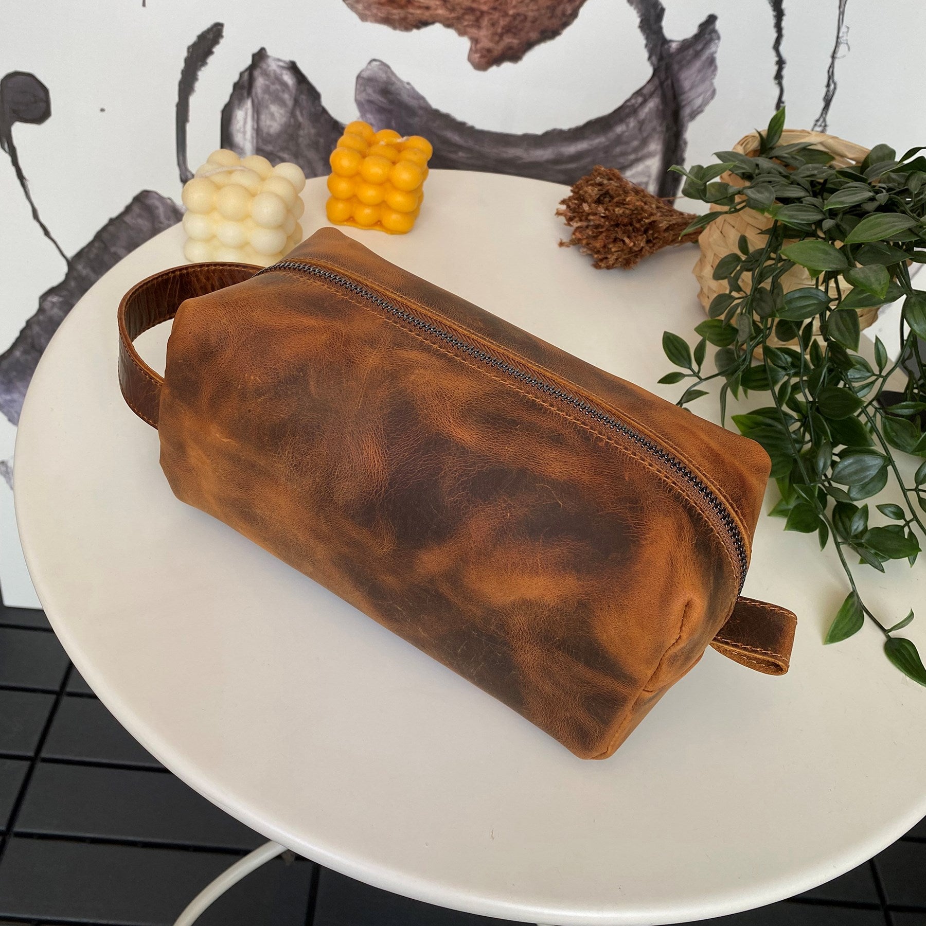 Partenon Genuine Leather Dopp Kit in various colors, showcasing its elegant design and zipper feature.