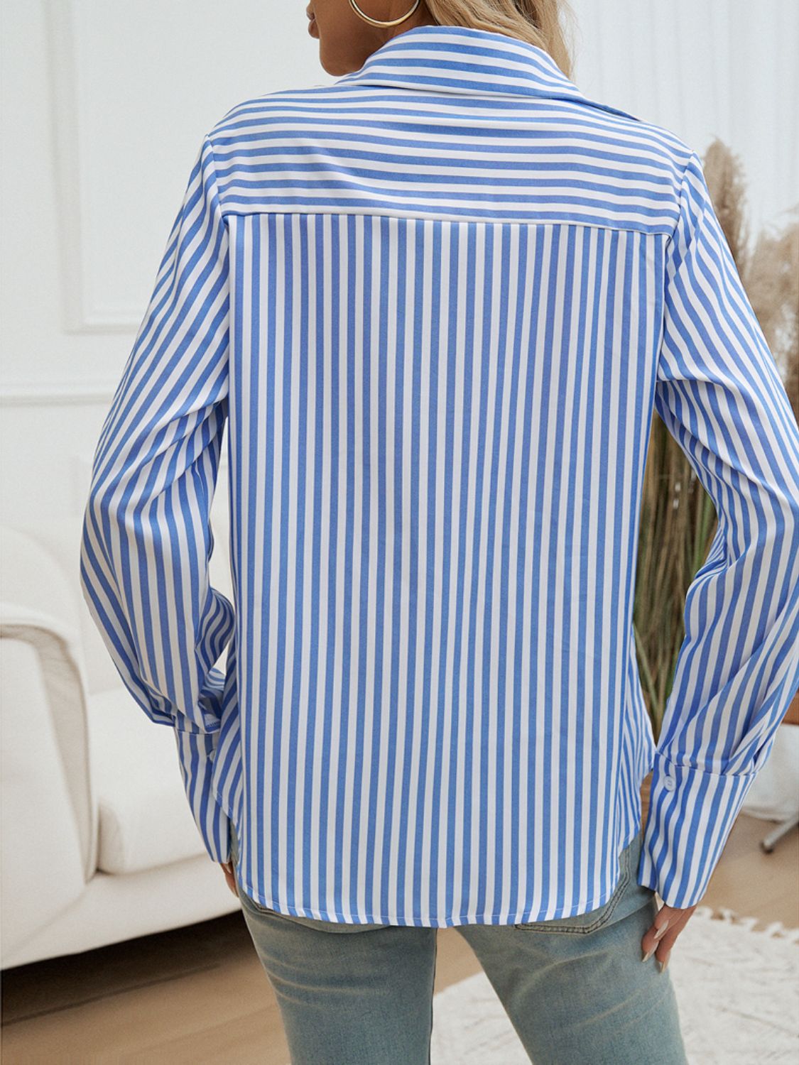 A stylish Pocketed Striped Collared Neck Long Sleeve Shirt featuring buttoned front and pocket, made from 100% polyester.
