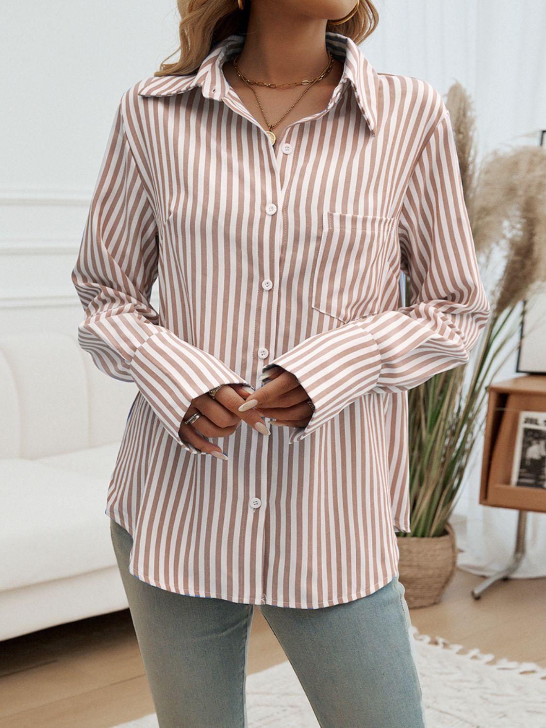A stylish Pocketed Striped Collared Neck Long Sleeve Shirt featuring buttoned front and pocket, made from 100% polyester.