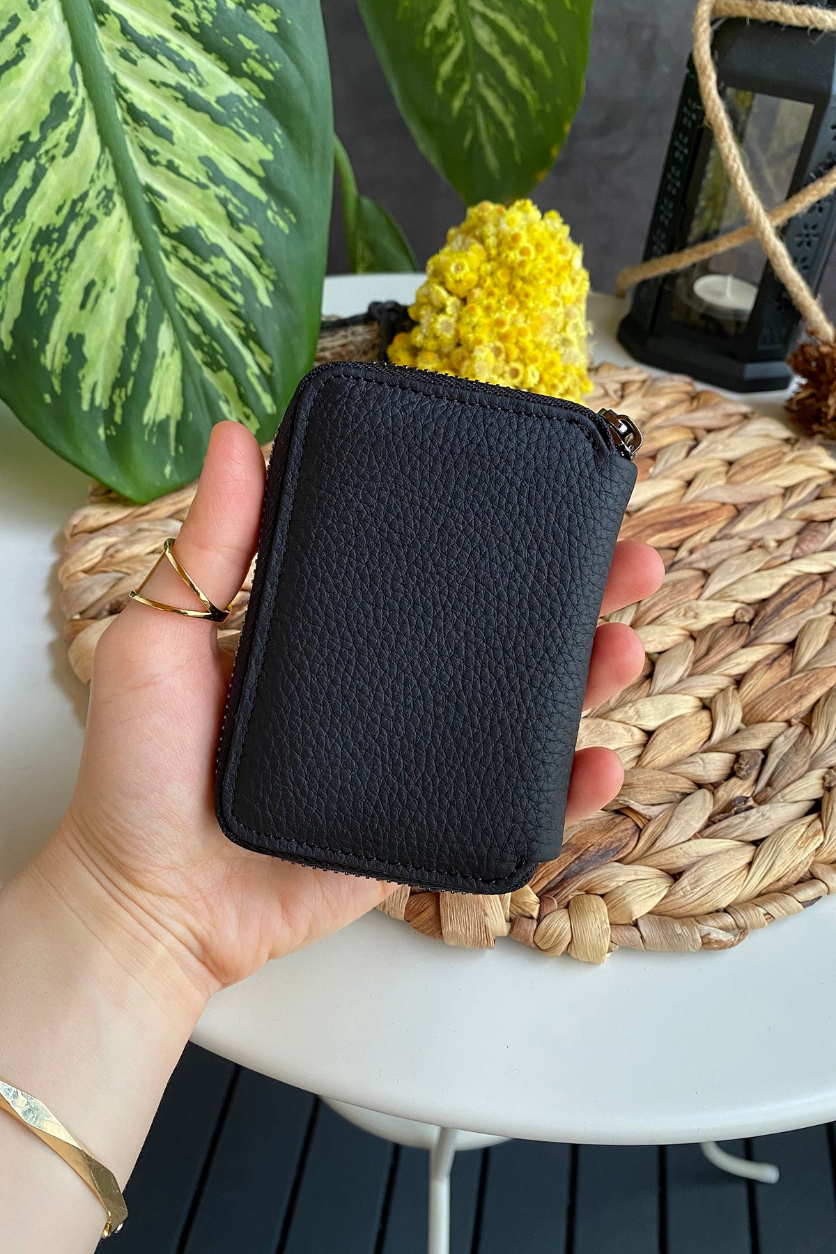 Porto Genuine Leather Wallet featuring a zipper, showcasing its elegant design and multiple card slots.