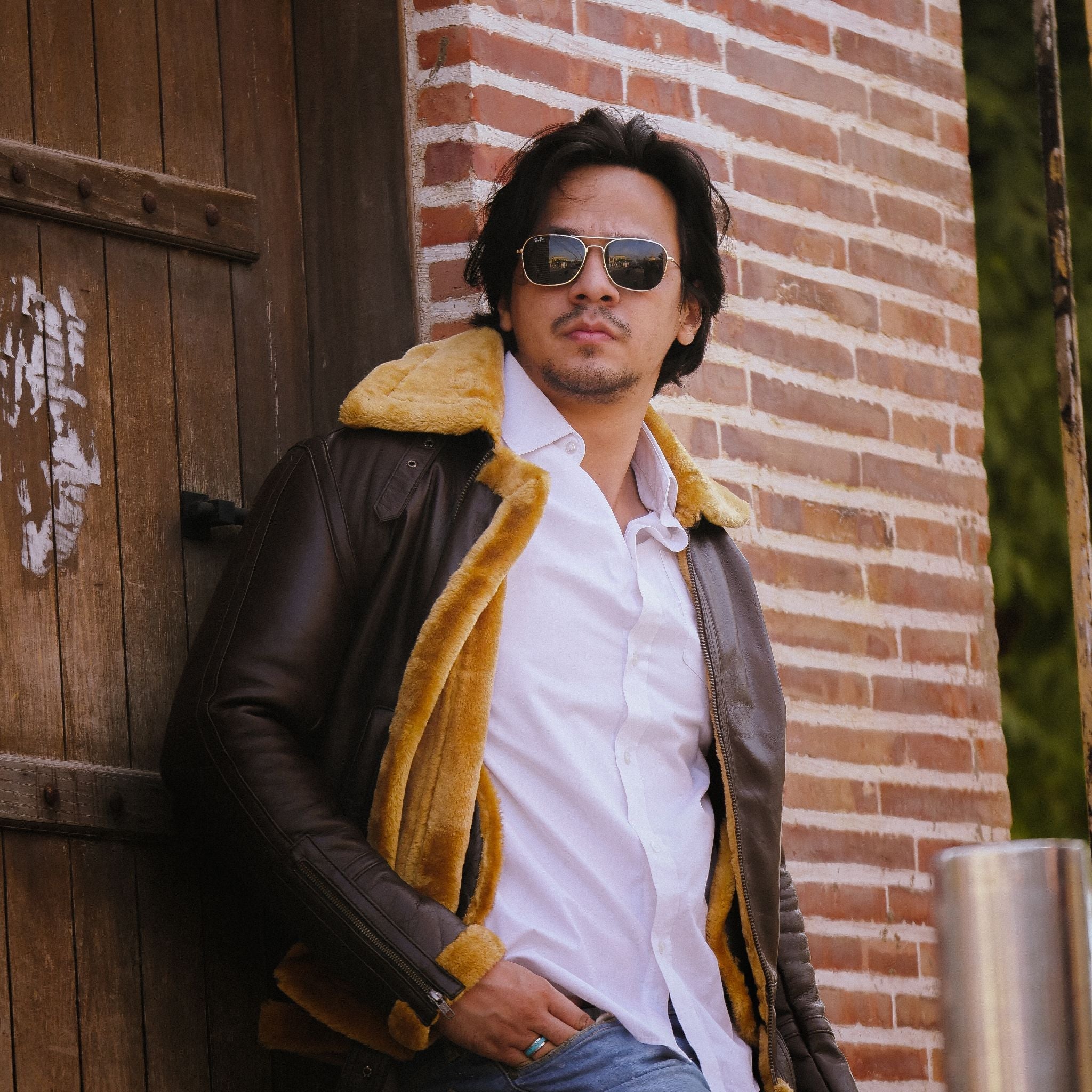 Premium Shearling Fur Leather Jacket in Brown, featuring genuine sheepskin leather, zipper sleeves, and full fur lining for warmth.