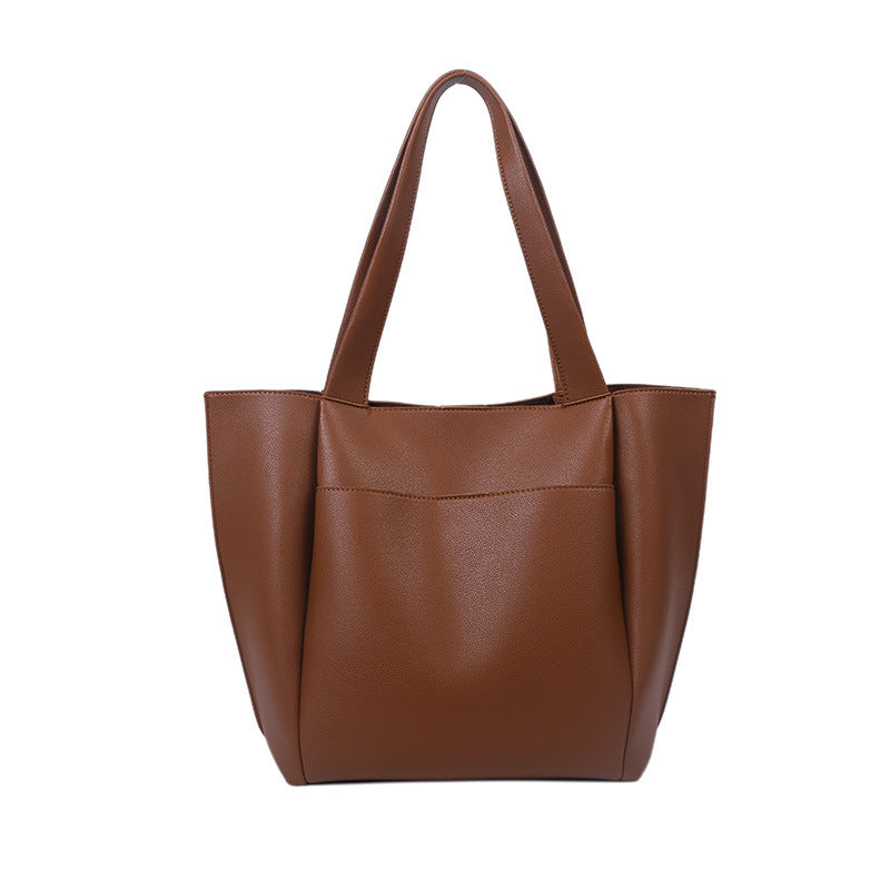 A stylish Retro PU Leather Hong Kong Style Handbag in a square shape, showcasing its chic design and durable material.