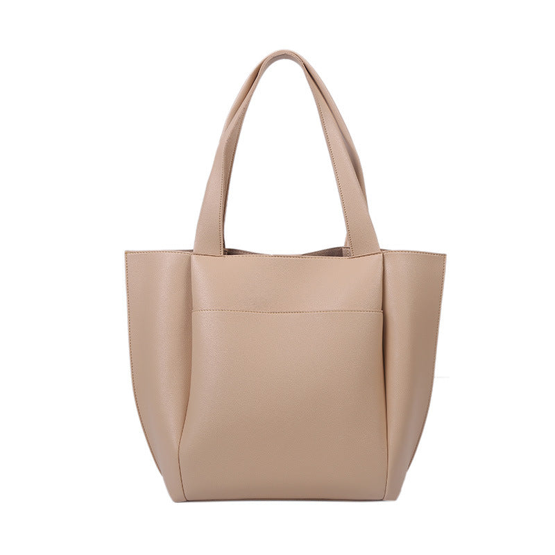 A stylish Retro PU Leather Hong Kong Style Handbag in a square shape, showcasing its chic design and durable material.