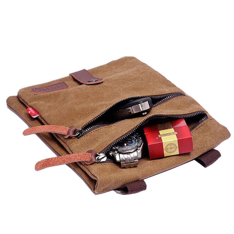 Retro style small messenger bag made of durable canvas, featuring a zipper closure and multiple internal pockets for organization.