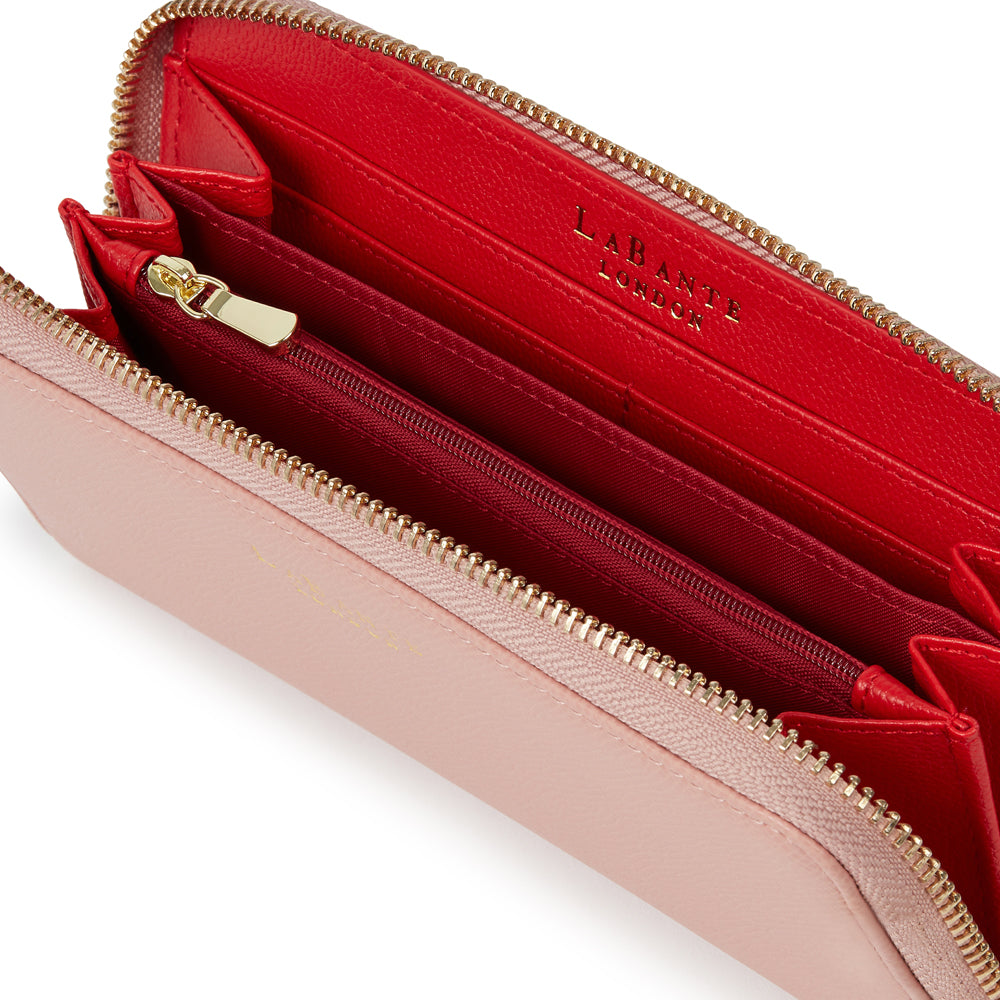 Robin Nude Vegan Wallet featuring textured exterior and zip-around design, ideal for everyday use.