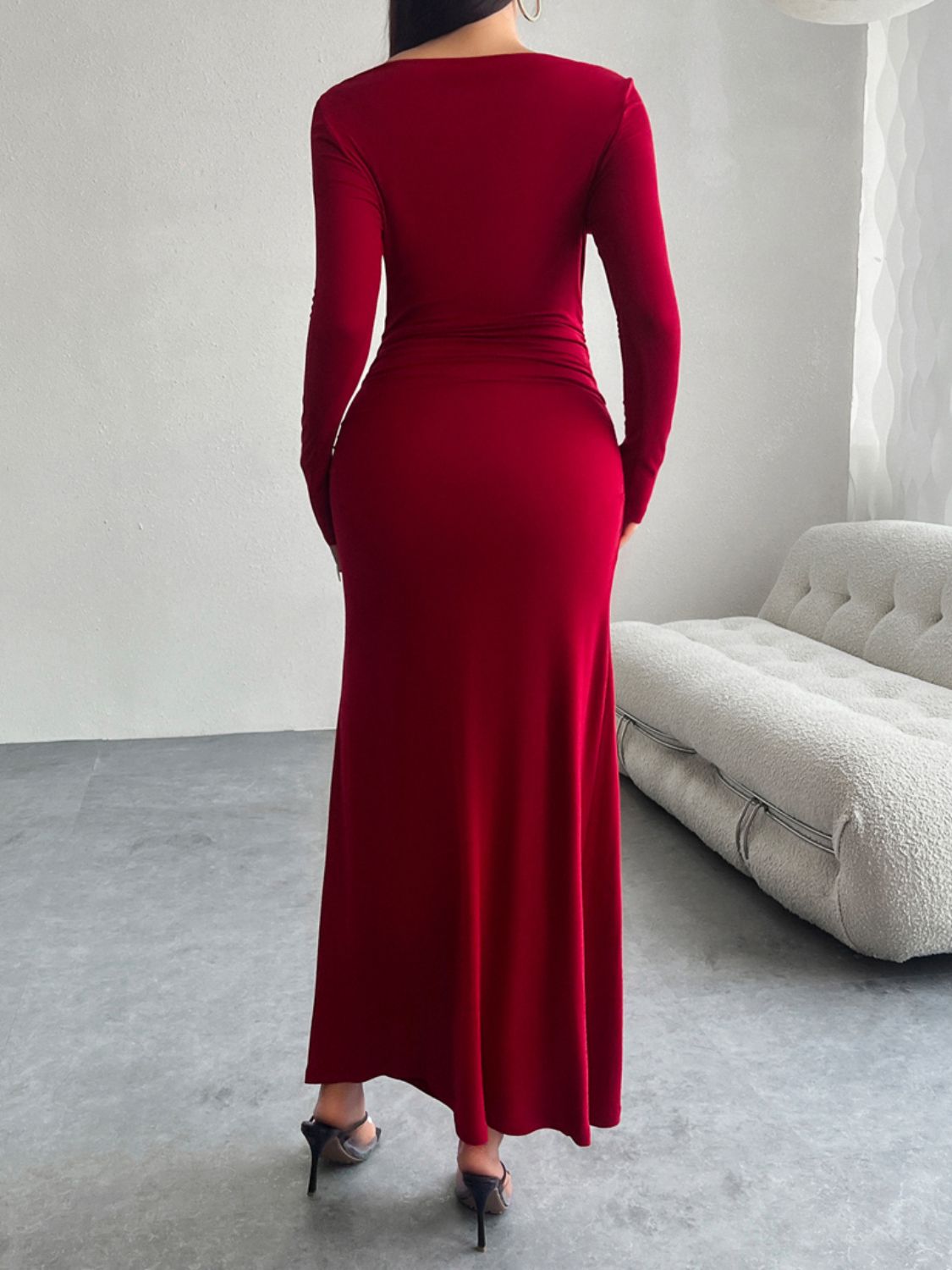 A stylish Ruched Long Sleeve Maxi Dress in a flattering silhouette, showcasing its elegant design and soft fabric.