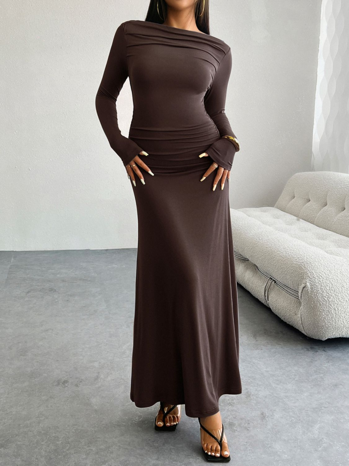 A stylish Ruched Long Sleeve Maxi Dress in a flattering silhouette, showcasing its elegant design and soft fabric.