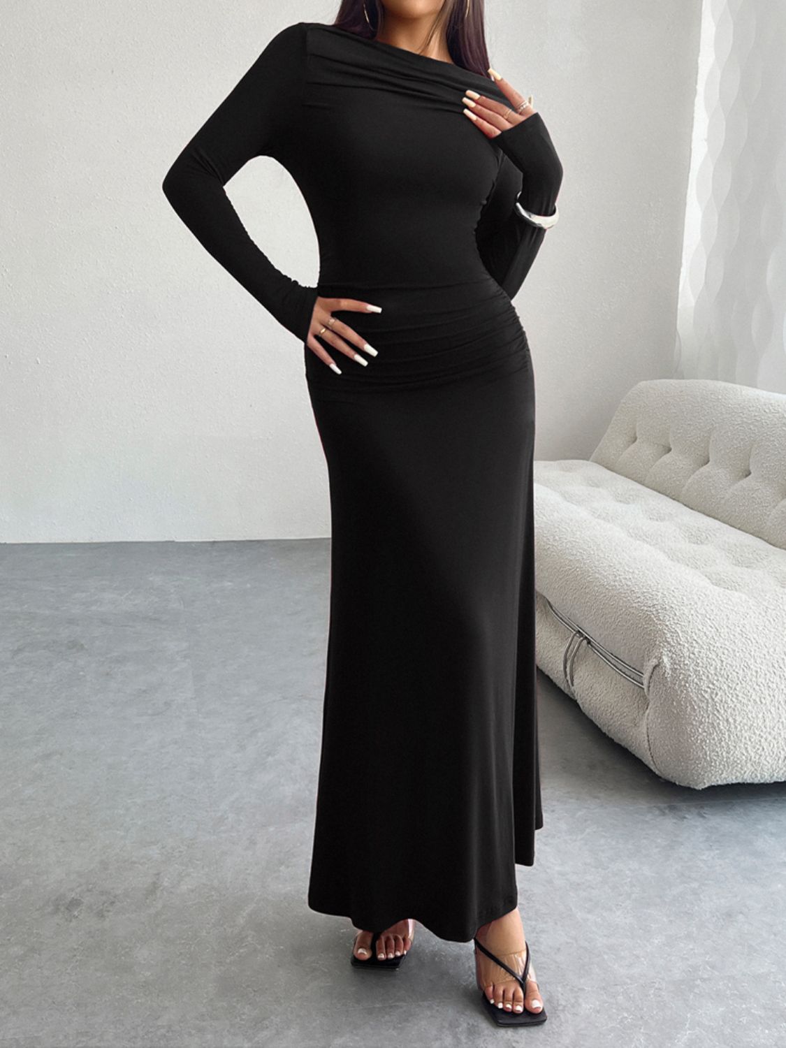 A stylish Ruched Long Sleeve Maxi Dress in a flattering silhouette, showcasing its elegant design and soft fabric.