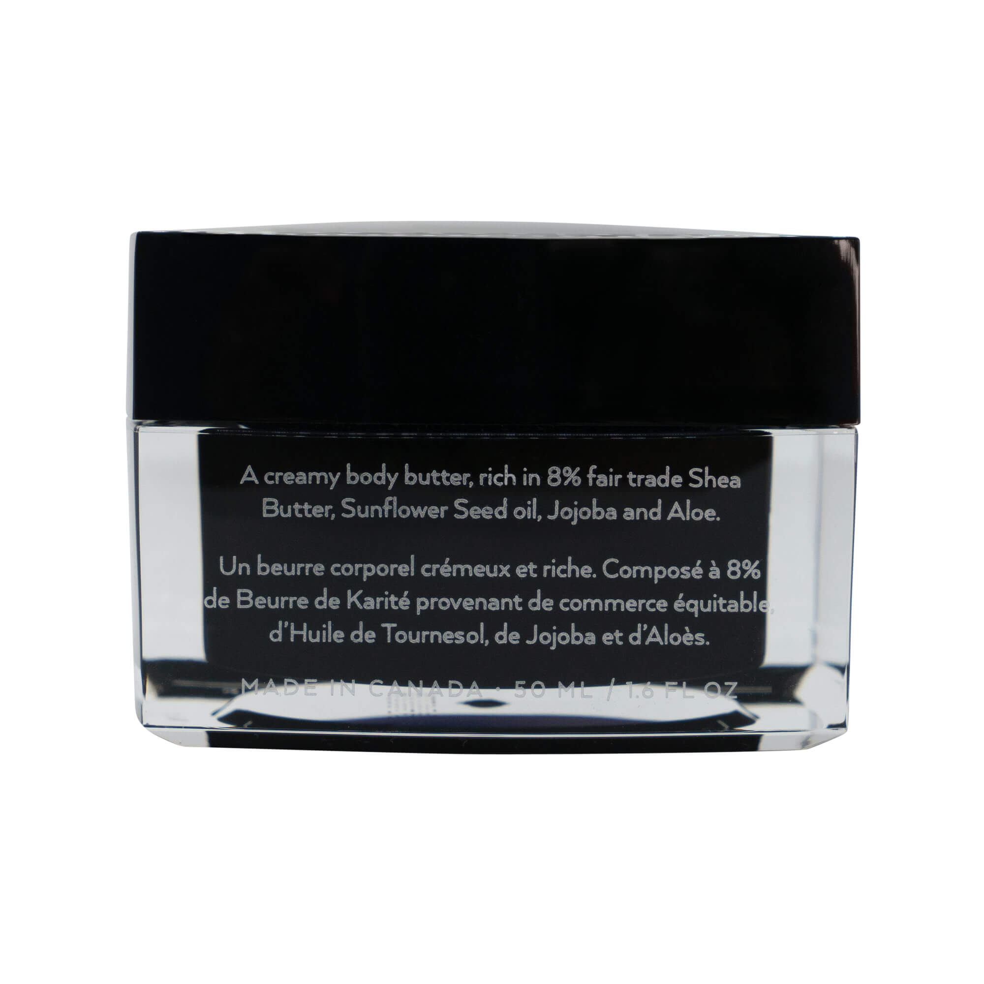 A jar of rich Shea Body Butter with a creamy texture, surrounded by natural ingredients like sunflower seeds and aloe leaves.