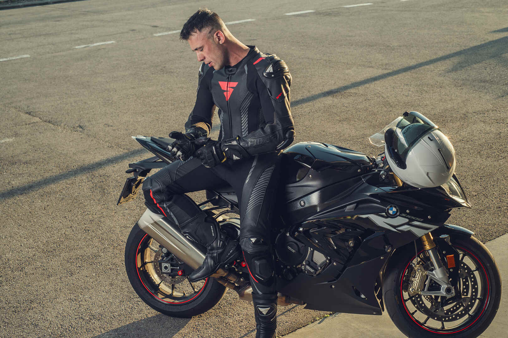 SHIMA Apex RS One Piece Motorcycle Leather Suit showcasing premium cowhide leather, protective features, and dynamic design.