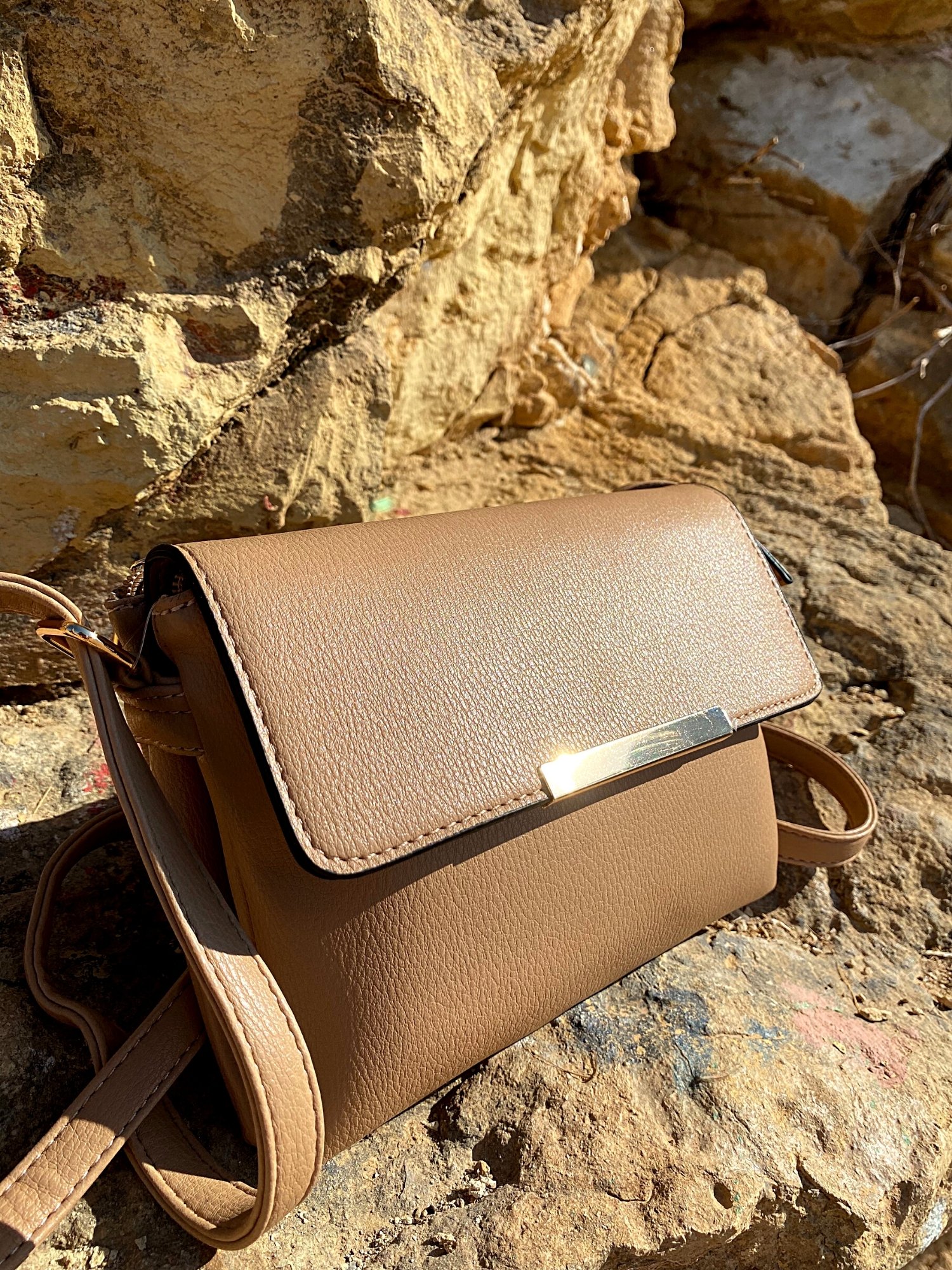 Stylish Shoulder Double Bag in black and beige with adjustable strap and zip pocket, showcasing its elegant design and functionality.