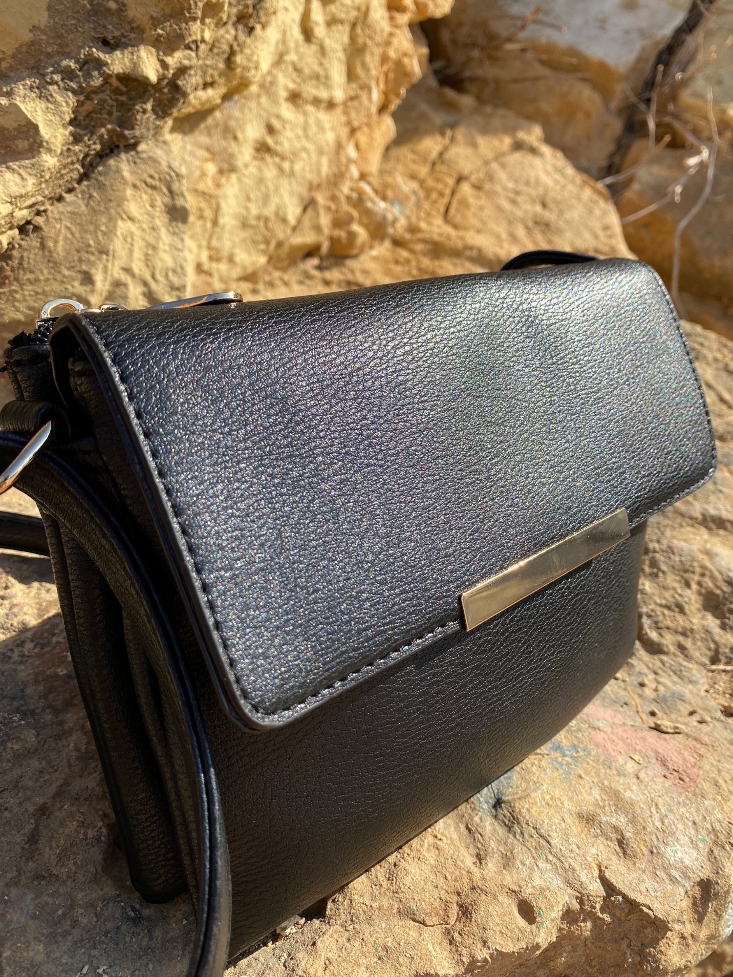 Stylish Shoulder Double Bag in black and beige with adjustable strap and zip pocket, showcasing its elegant design and functionality.