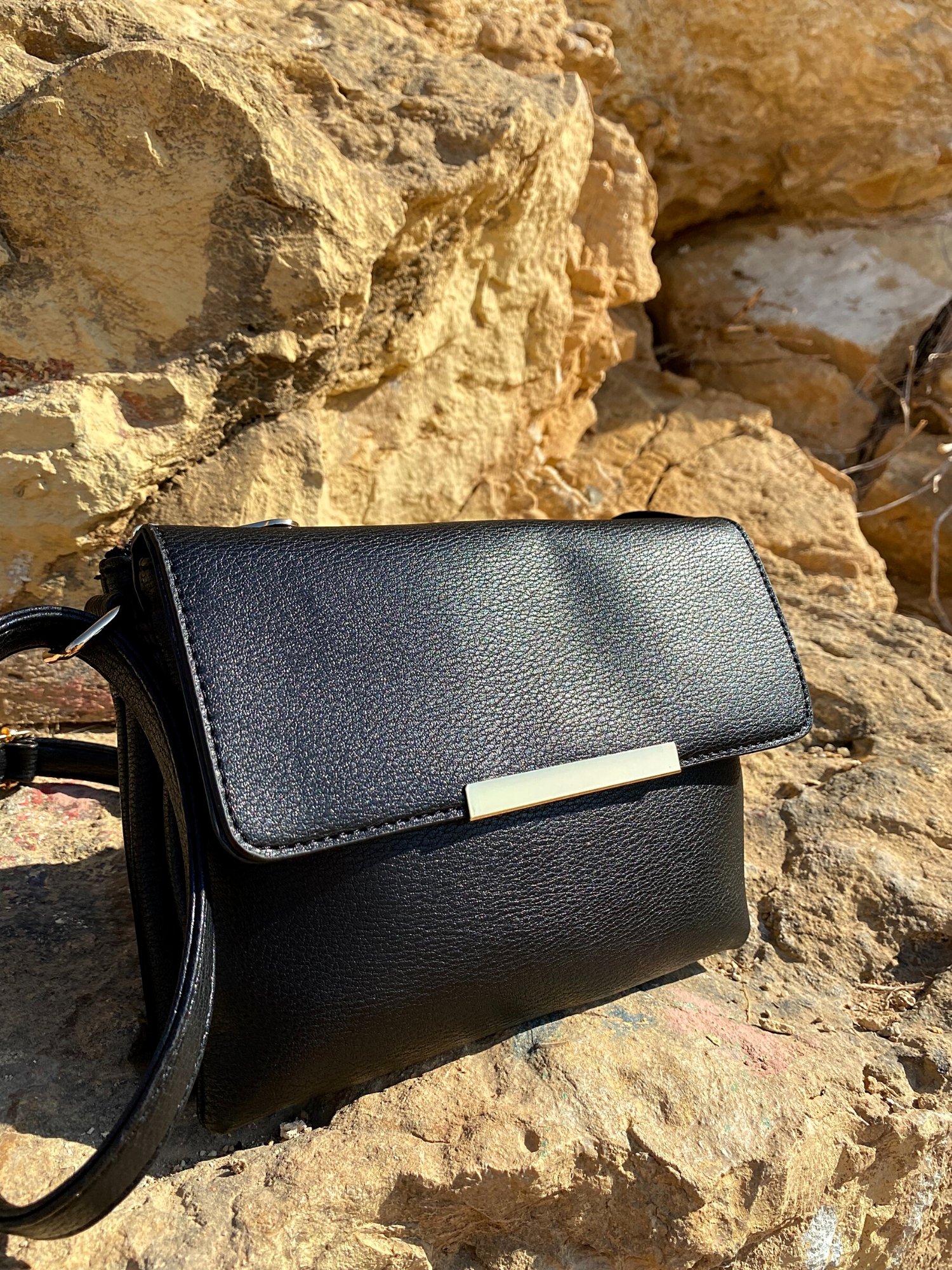 Stylish Shoulder Double Bag in black and beige with adjustable strap and zip pocket, showcasing its elegant design and functionality.