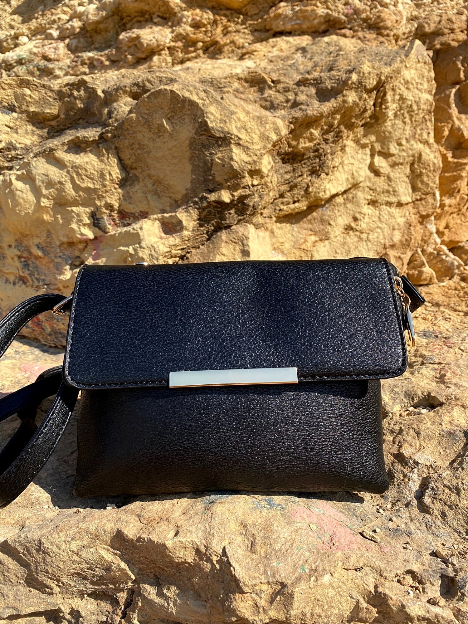 Stylish Shoulder Double Bag in black and beige with adjustable strap and zip pocket, showcasing its elegant design and functionality.