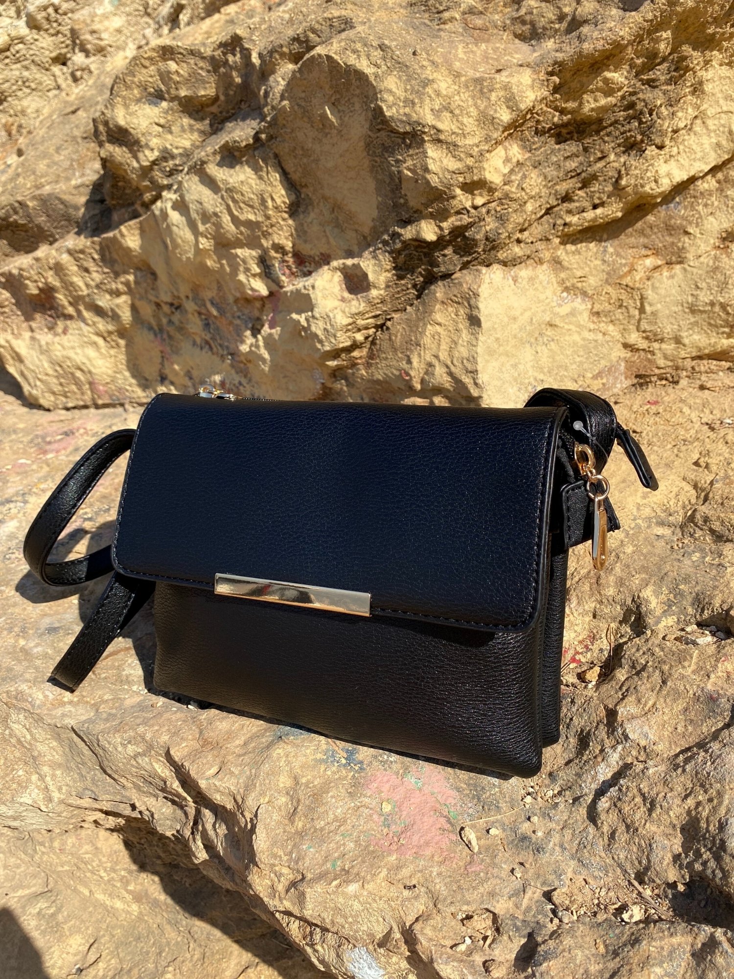 Stylish Shoulder Double Bag in black and beige with adjustable strap and zip pocket, showcasing its elegant design and functionality.