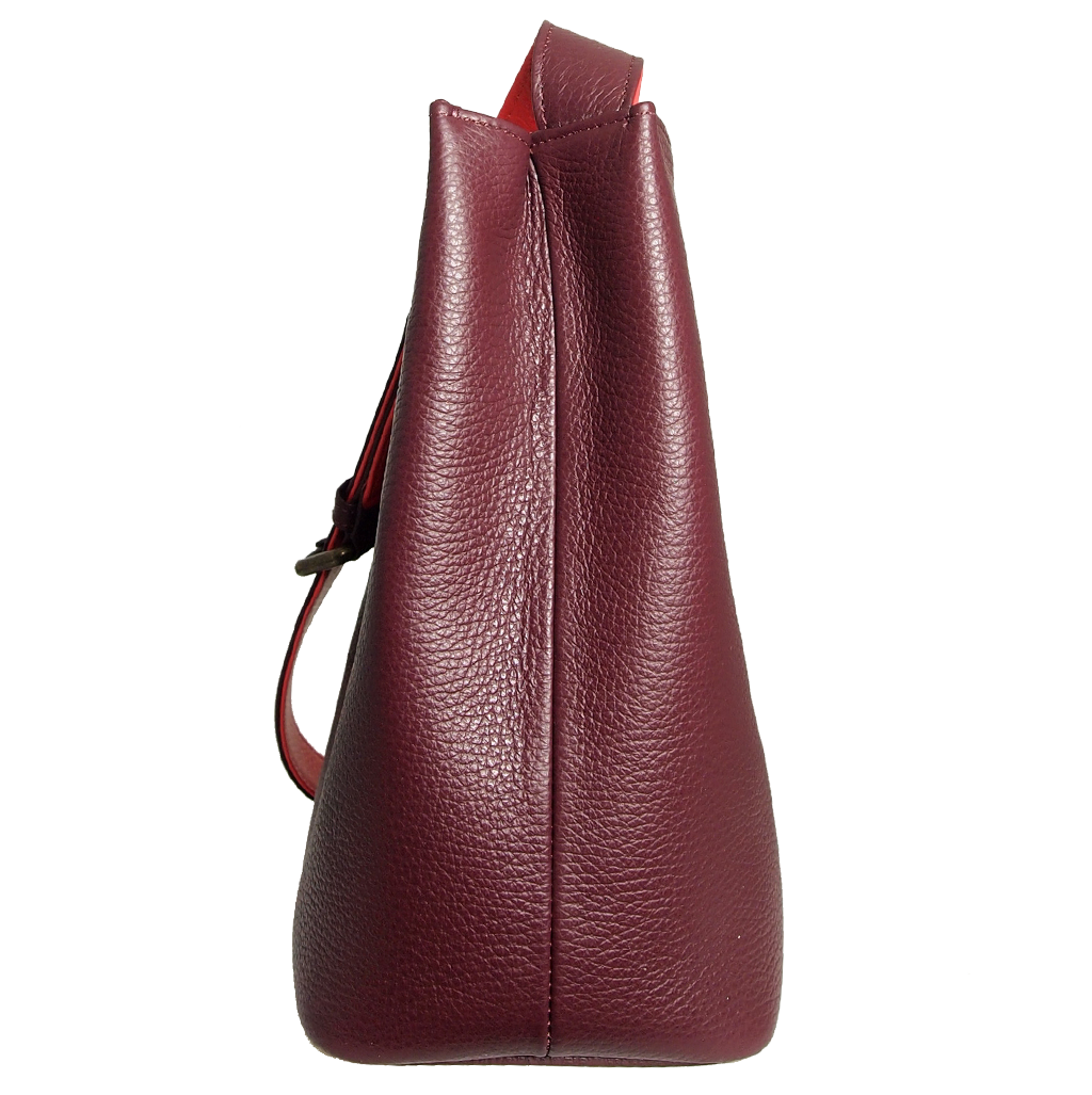 Shoulder Hobo Tote in Bordeaux-Coral, crafted from pebbled Italian calf leather with a duo-tone strap and burnished brass buckle.