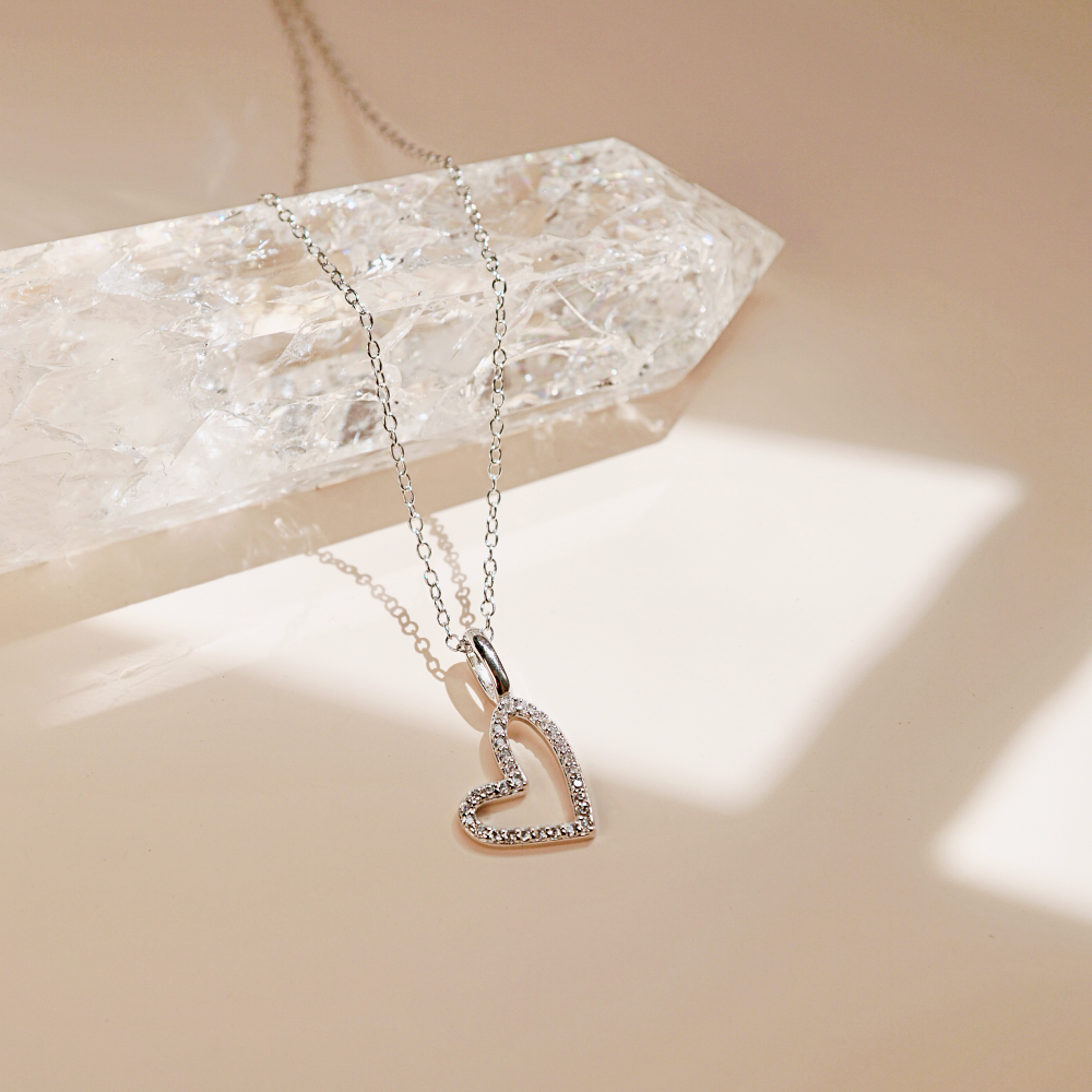A stunning Silver Eternal Heart Necklace featuring a delicate heart-shaped pendant and an adjustable chain, symbolizing love and self-acceptance.