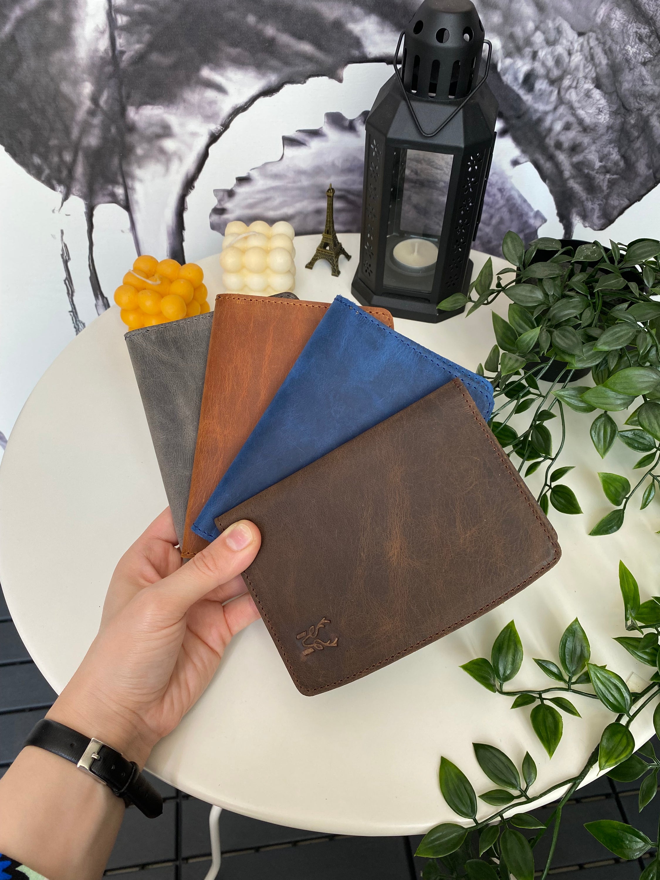Simenit Genuine Leather Passport Holder in various colors, showcasing its elegant design and functionality.