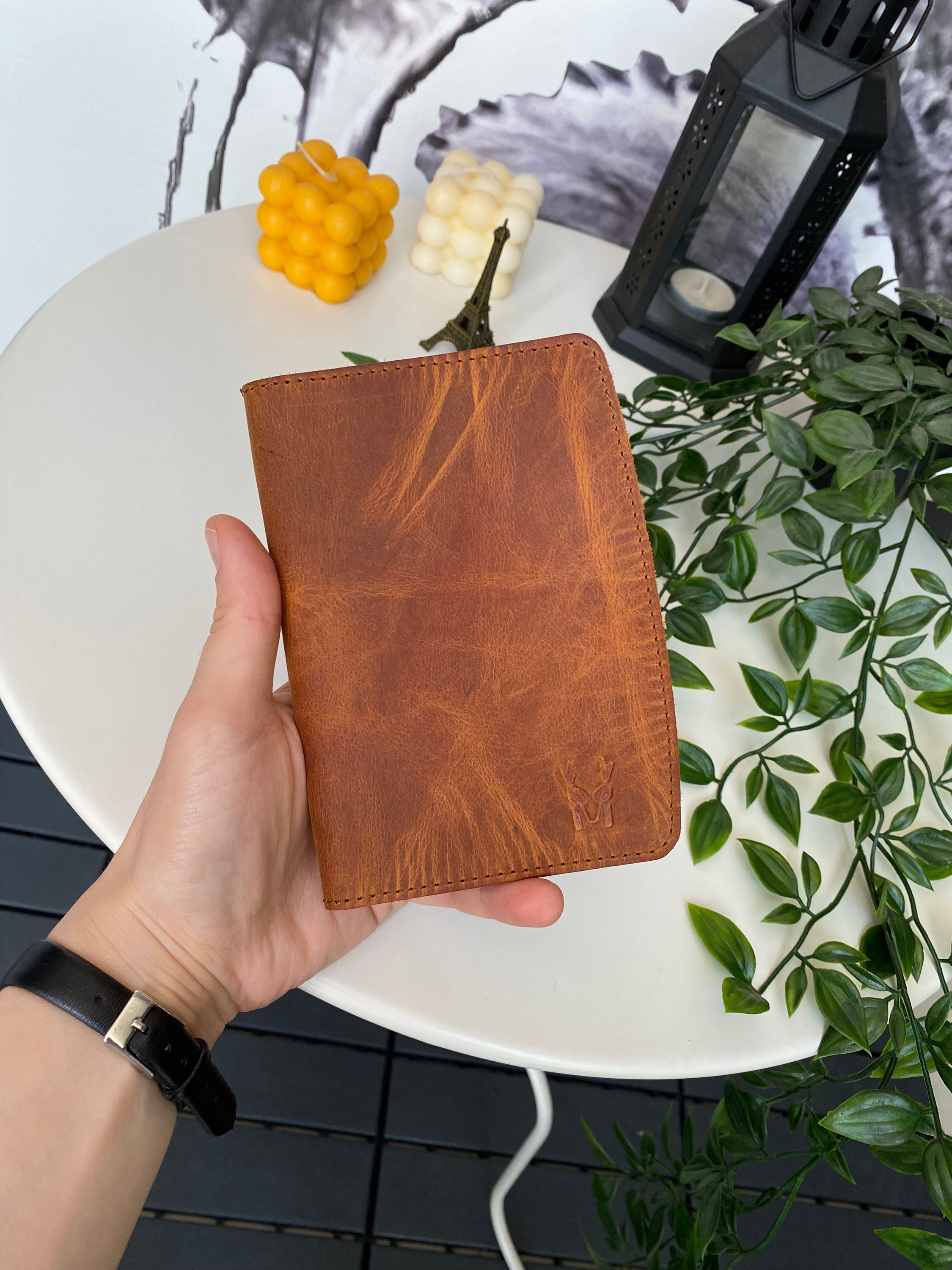 Simenit Genuine Leather Passport Holder in various colors, showcasing its elegant design and functionality.