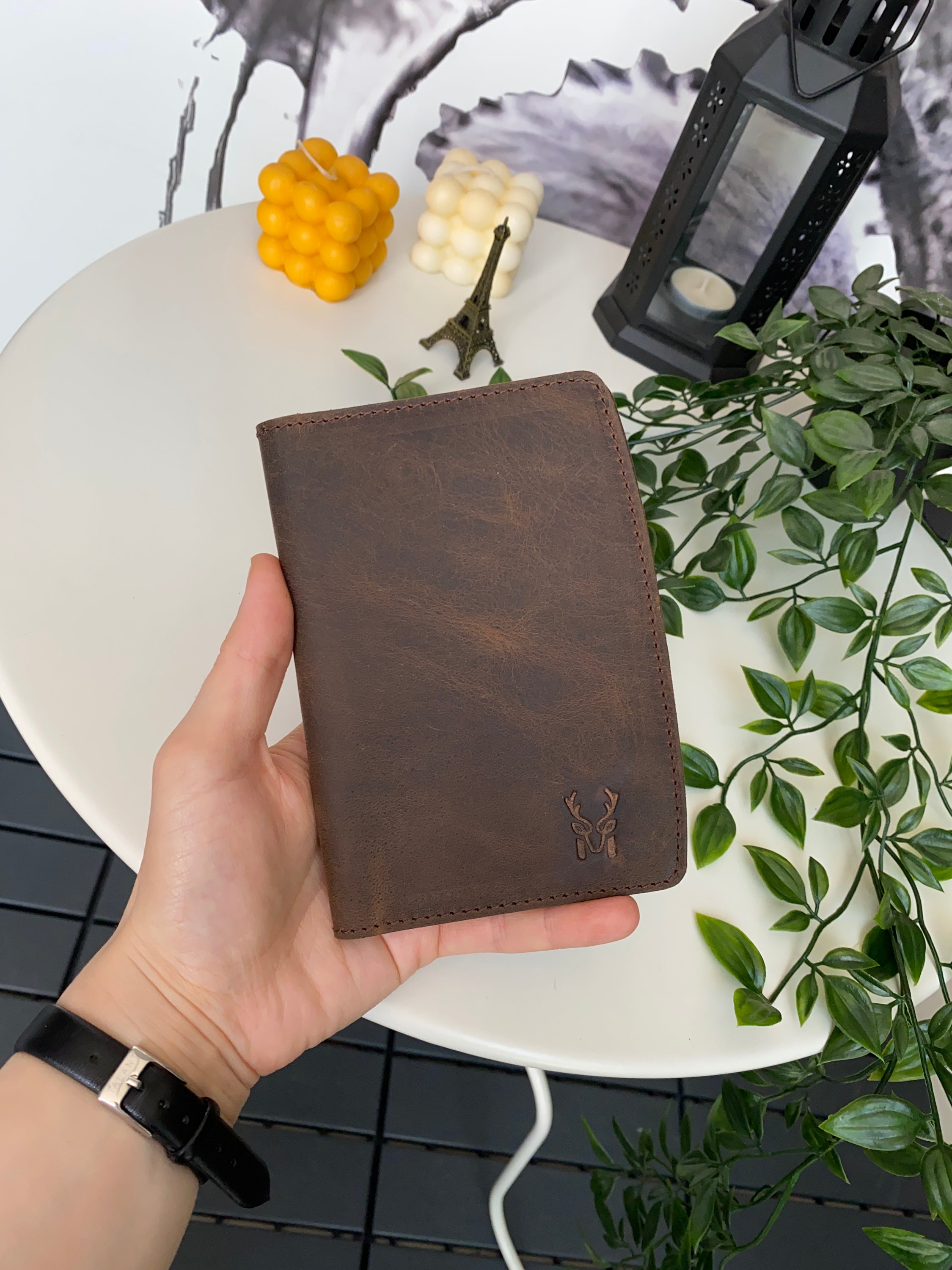 Simenit Genuine Leather Passport Holder in various colors, showcasing its elegant design and functionality.