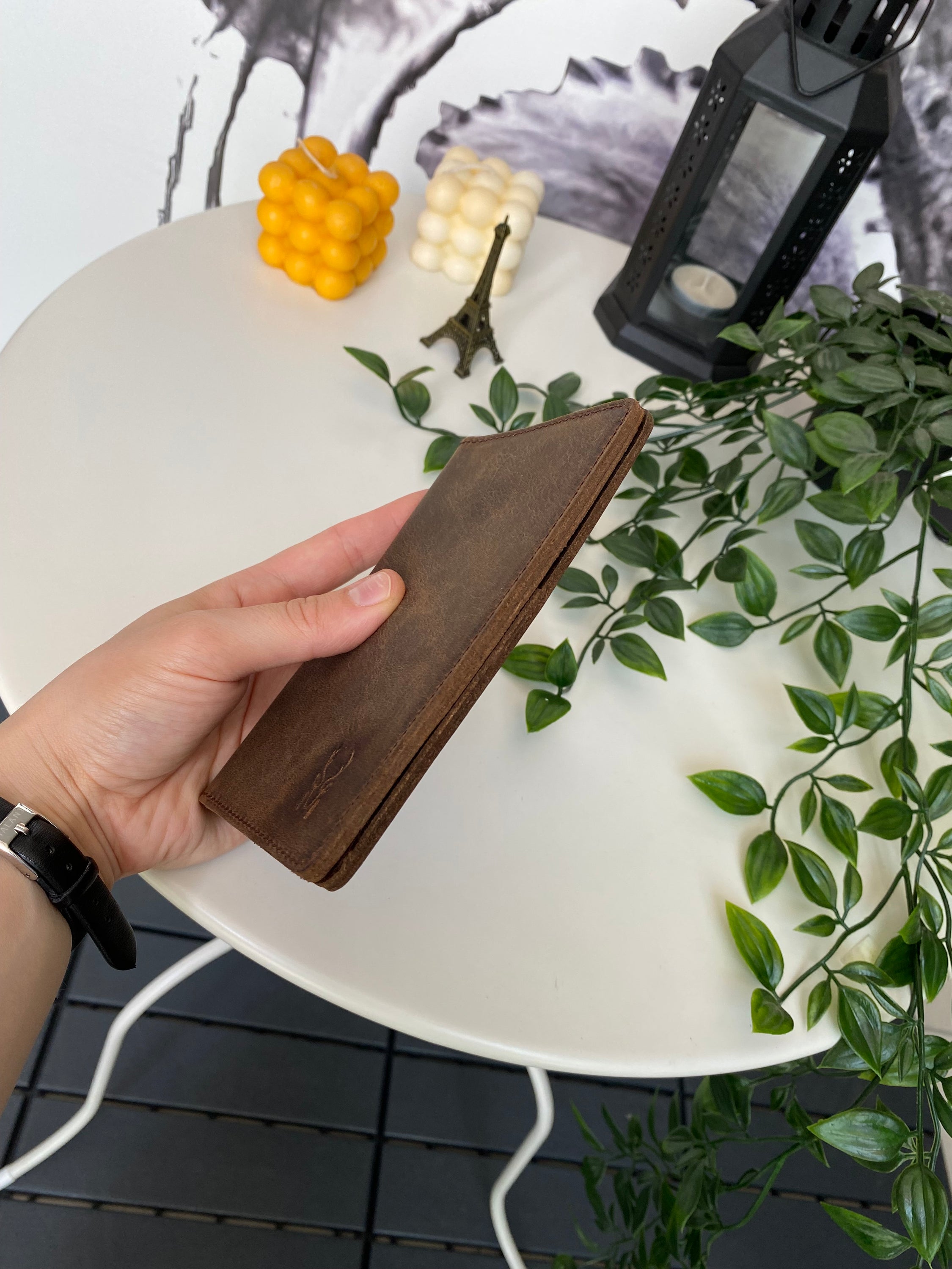 Simenit Genuine Leather Passport Holder in various colors, showcasing its elegant design and functionality.