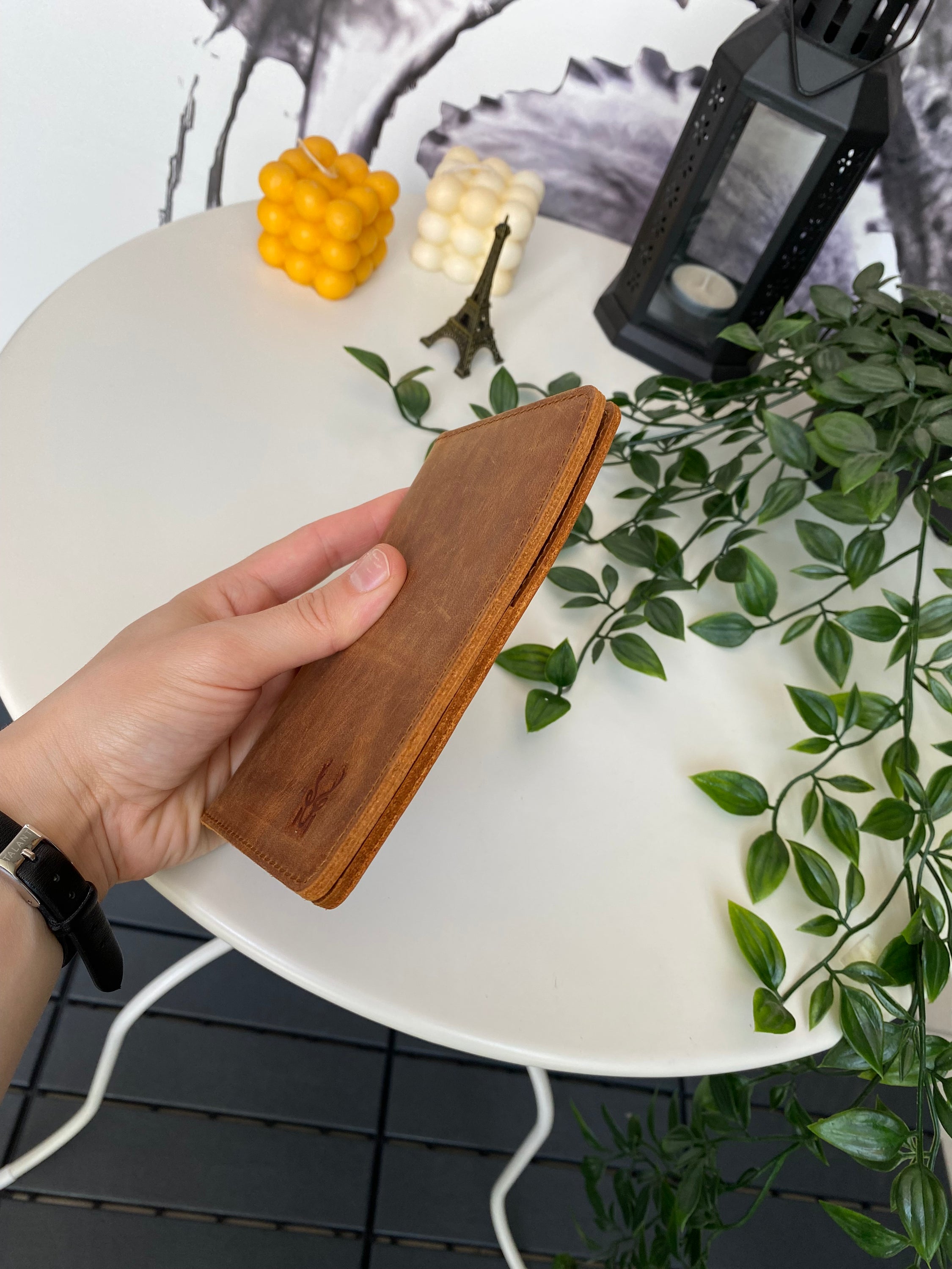 Simenit Genuine Leather Passport Holder in various colors, showcasing its elegant design and functionality.