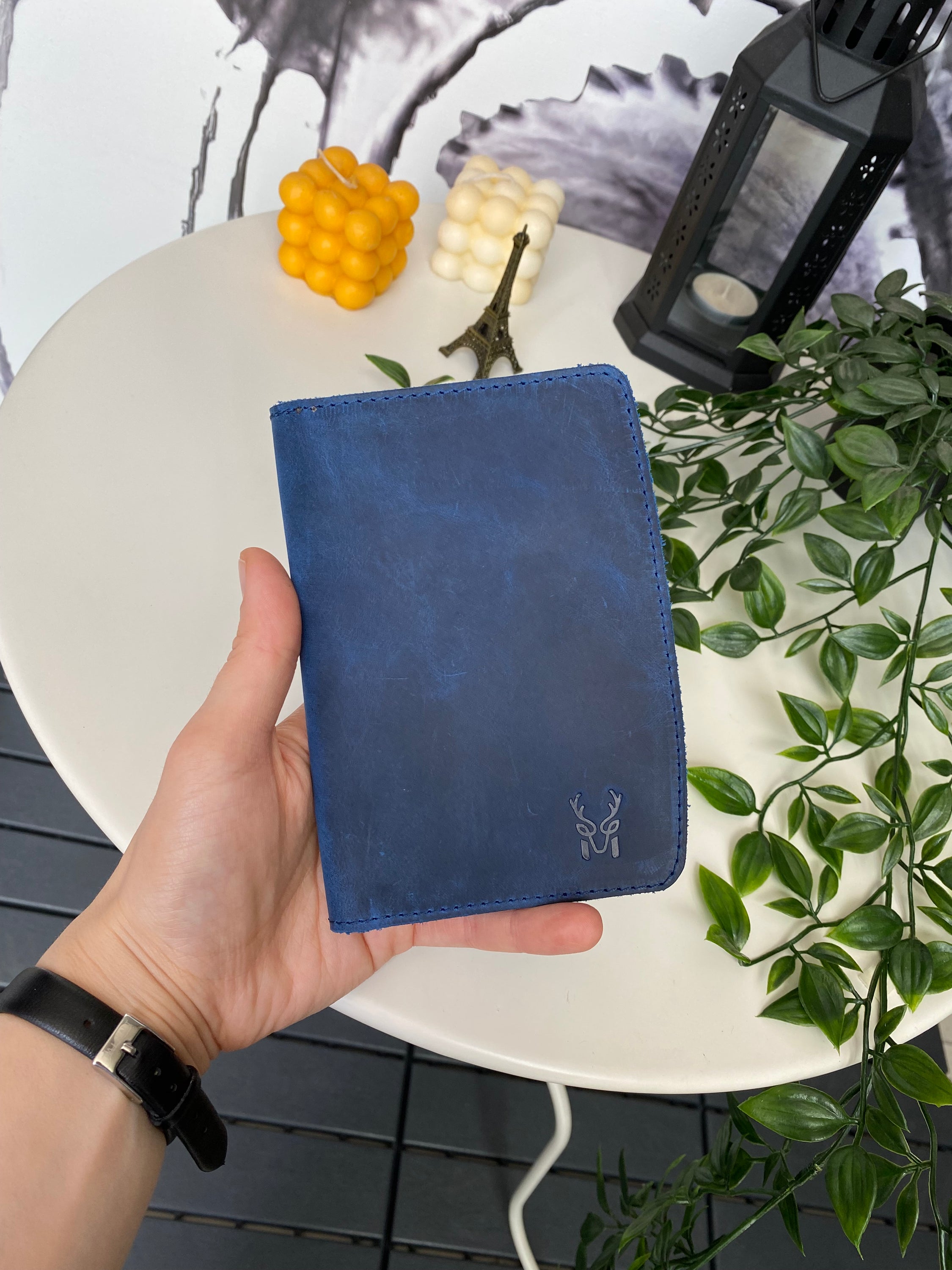 Simenit Genuine Leather Passport Holder in various colors, showcasing its elegant design and functionality.