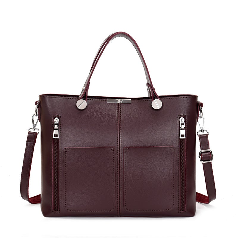 A stylish Simple and Fashionable Crossbody Stitching Messenger Bag made of PU material, featuring a solid color design and compact size.