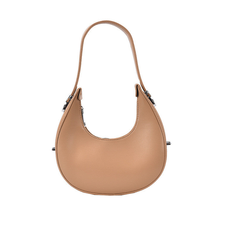 A stylish Simple Portable Fashion One-Shoulder Chain Messenger Bag in a semicircle shape with a soft handle and zipper opening, perfect for everyday use.
