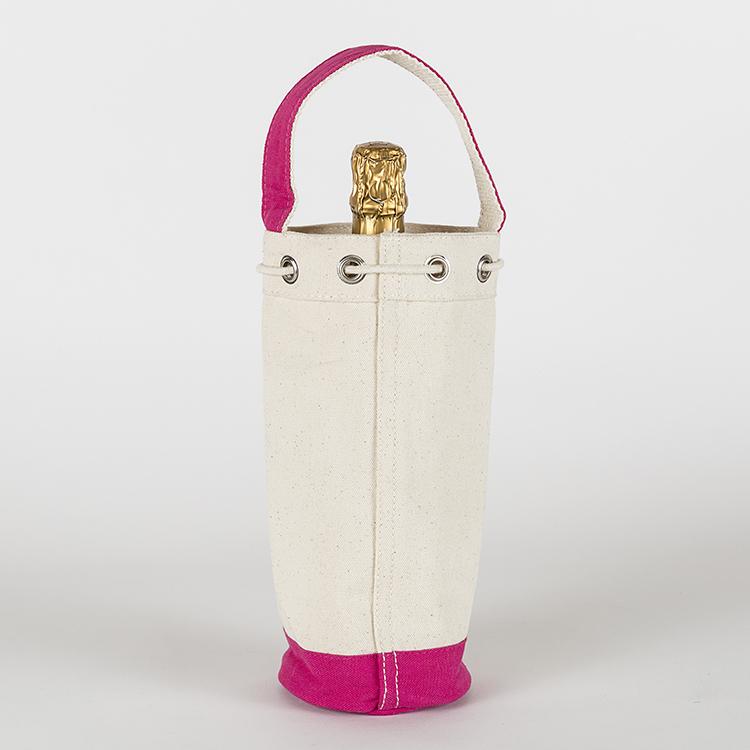 A sturdy canvas wine bag with a cinch top and colorful trim, designed to hold a single bottle of champagne or wine securely.