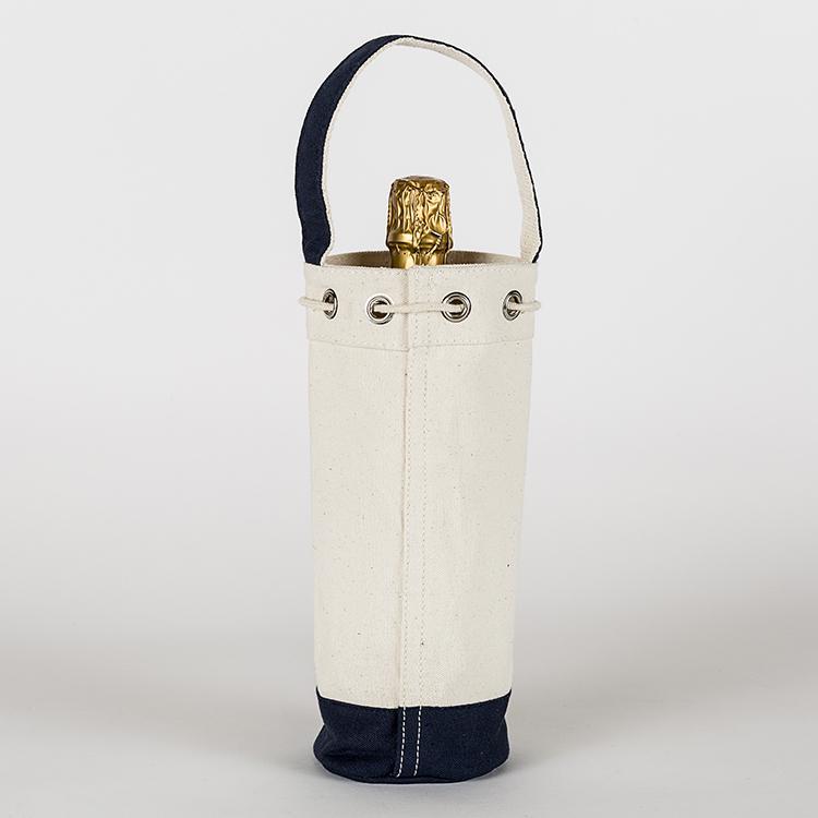 A sturdy canvas wine bag with a cinch top and colorful trim, designed to hold a single bottle of champagne or wine securely.