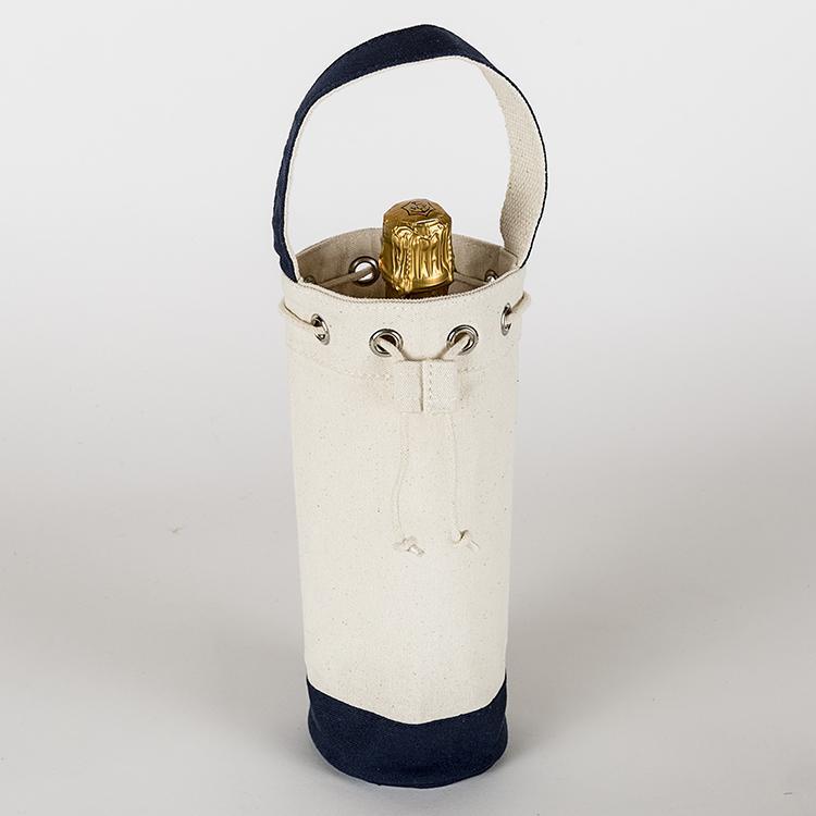 A sturdy canvas wine bag with a cinch top and colorful trim, designed to hold a single bottle of champagne or wine securely.