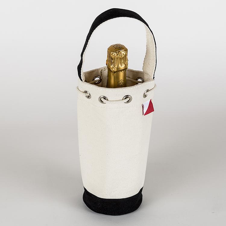 A sturdy canvas wine bag with a cinch top and colorful trim, designed to hold a single bottle of champagne or wine securely.